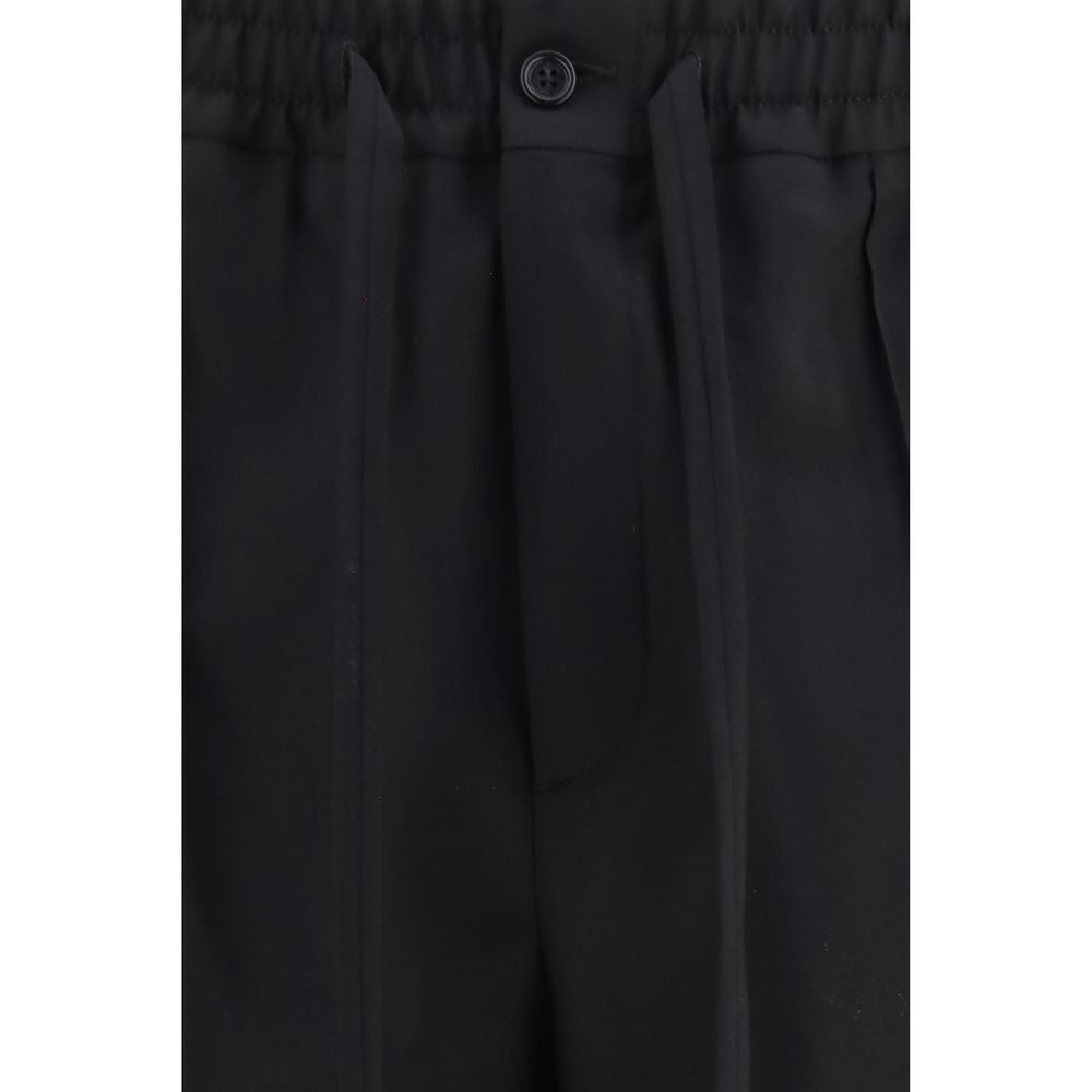 Discover the Valentino Garavani Black Cotton Chino Pants, a refined blend of luxury and versatility, crafted from premium cotton gabardine for an elevated style.