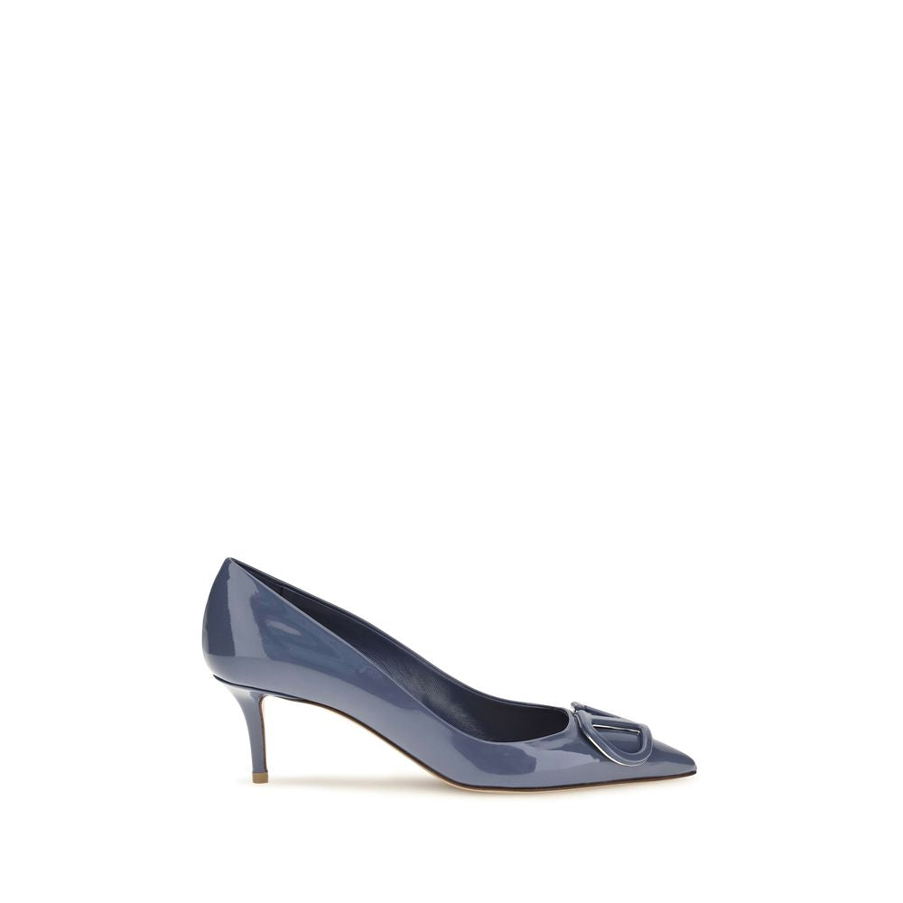 Indulge in the elegance of Valentino Garavani's Blue Calf Leather Bos Taurus High Heel Pumps, where exquisite craftsmanship meets timeless sophistication for the discerning connoisseur.