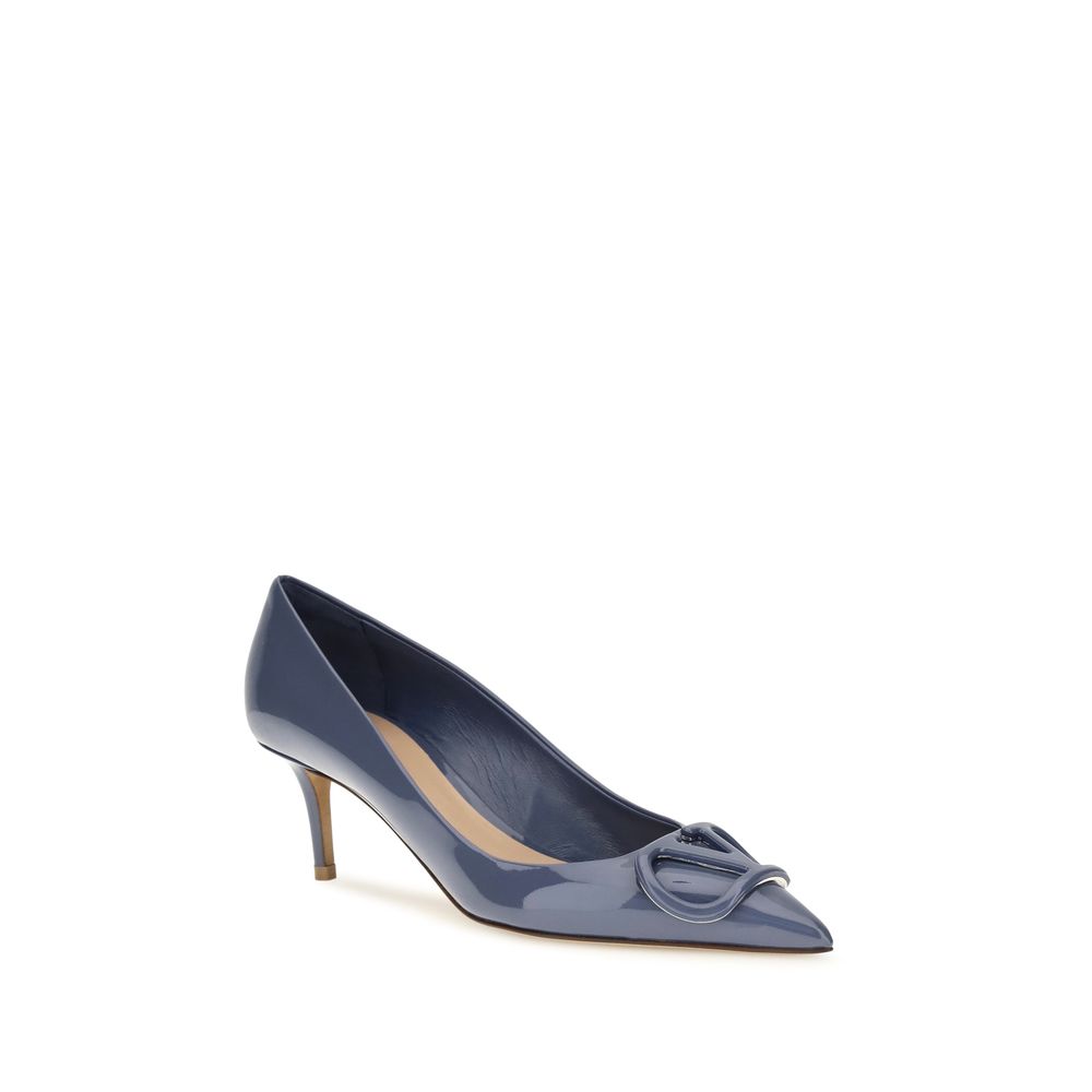 Experience the allure of Valentino Garavani's Blue Calf Leather Bos Taurus High Heel Pumps, where exquisite craftsmanship meets timeless elegance, perfect for the discerning individual.