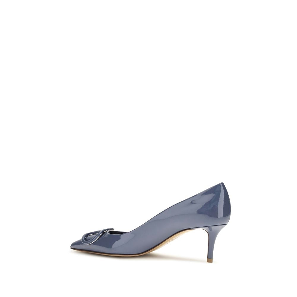 Elevate your elegance with Valentino Garavani's Blue Calf Leather Bos Taurus High Heel Pumps, a masterpiece of Italian craftsmanship that redefines sophistication and allure.