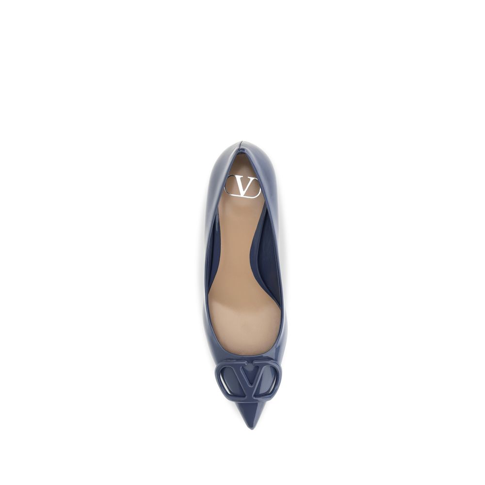 Indulge in the elegance of Valentino Garavani's Blue Calf Leather Bos Taurus High Heel Pumps, a masterpiece of Italian craftsmanship that redefines luxury and sophistication.