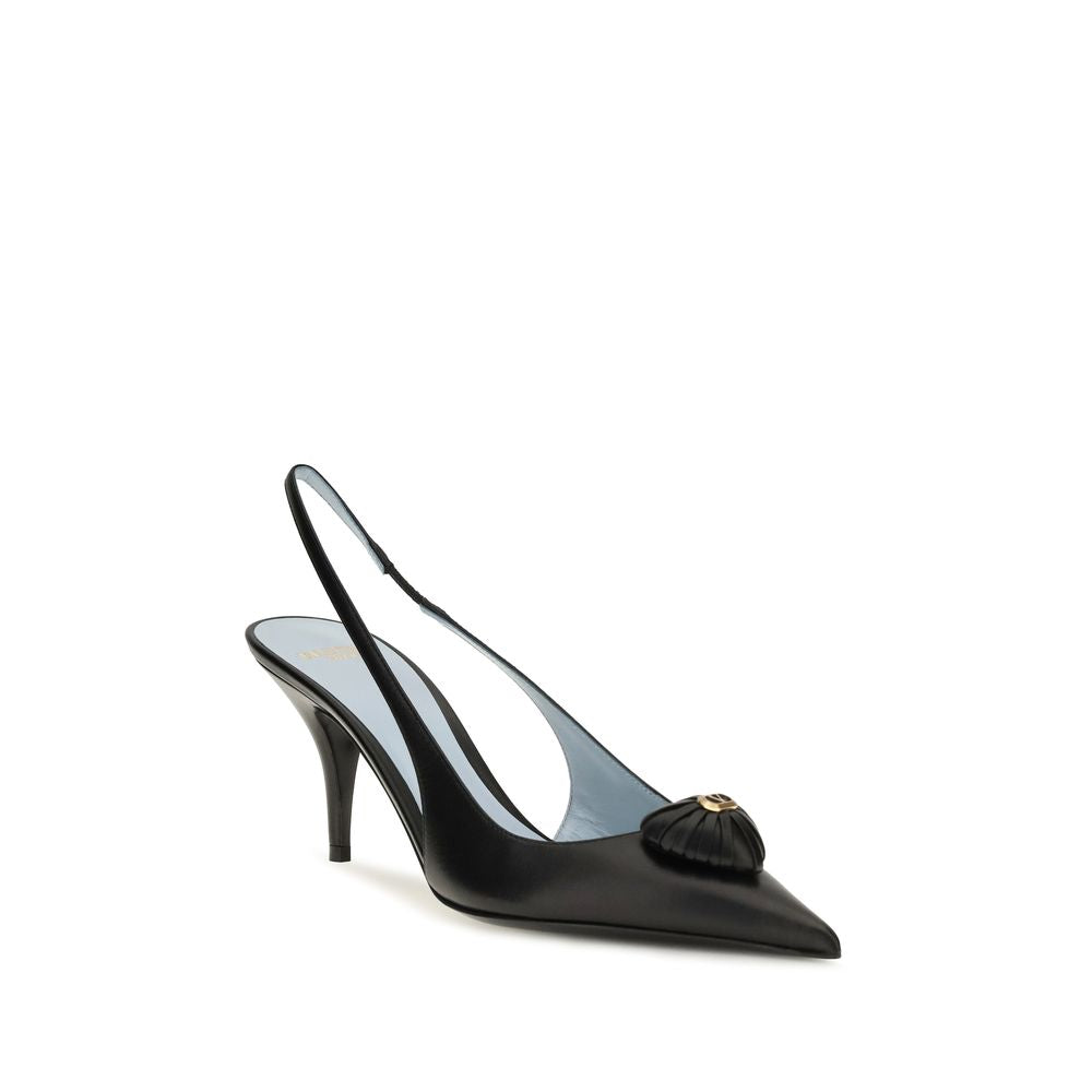 Indulge in the exquisite elegance of Valentino Garavani's Black Calf Leather Bos Taurus High Heel Pumps, where romantic charm meets luxurious craftsmanship for the discerning individual.