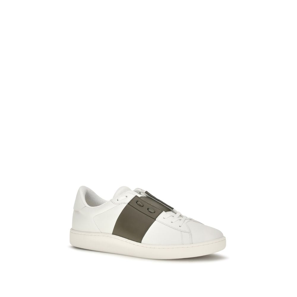 Indulge in the exquisite Valentino Garavani White Calf Leather Bos Taurus Low Top Sneakers, where timeless elegance meets unparalleled comfort, perfect for discerning tastes.