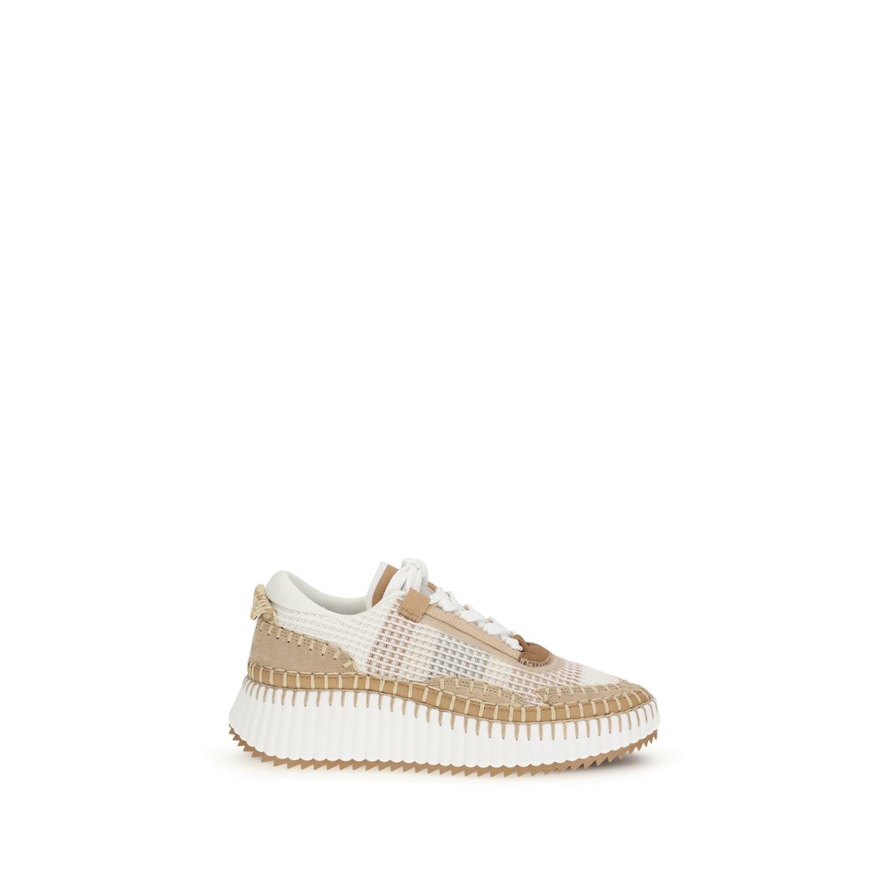 Indulge in the elegance of Chloé's Nama Sneakers, crafted from recycled materials for a sustainable yet luxurious stride. Experience contemporary style and comfort.