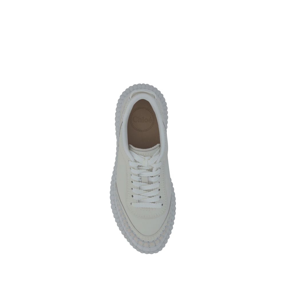 Elevate your style with Chloé's White Calf Leather Bos Taurus Platform Sneakers, a masterpiece of contemporary design and luxurious comfort, perfect for modern elegance.