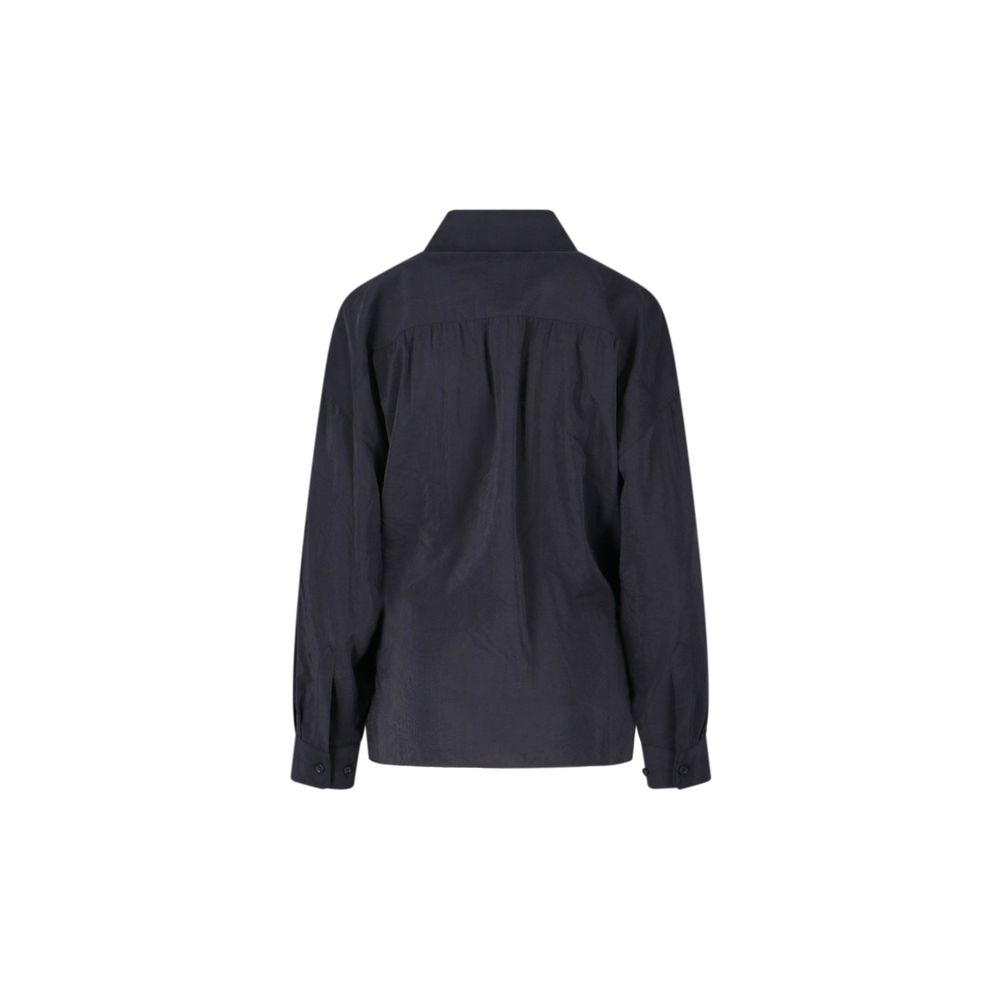 Indulge in the exquisite Lemaire Black Polyamide Shirt, crafted from luxurious silk and polyamide, embodying elegance and sophistication for the discerning individual.