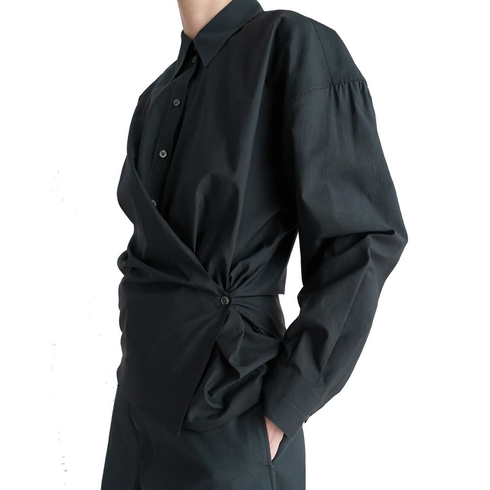 Indulge in the exquisite Lemaire Black Polyamide Shirt, crafted from luxurious silk and polyamide, embodying timeless elegance and sophistication for the discerning individual.