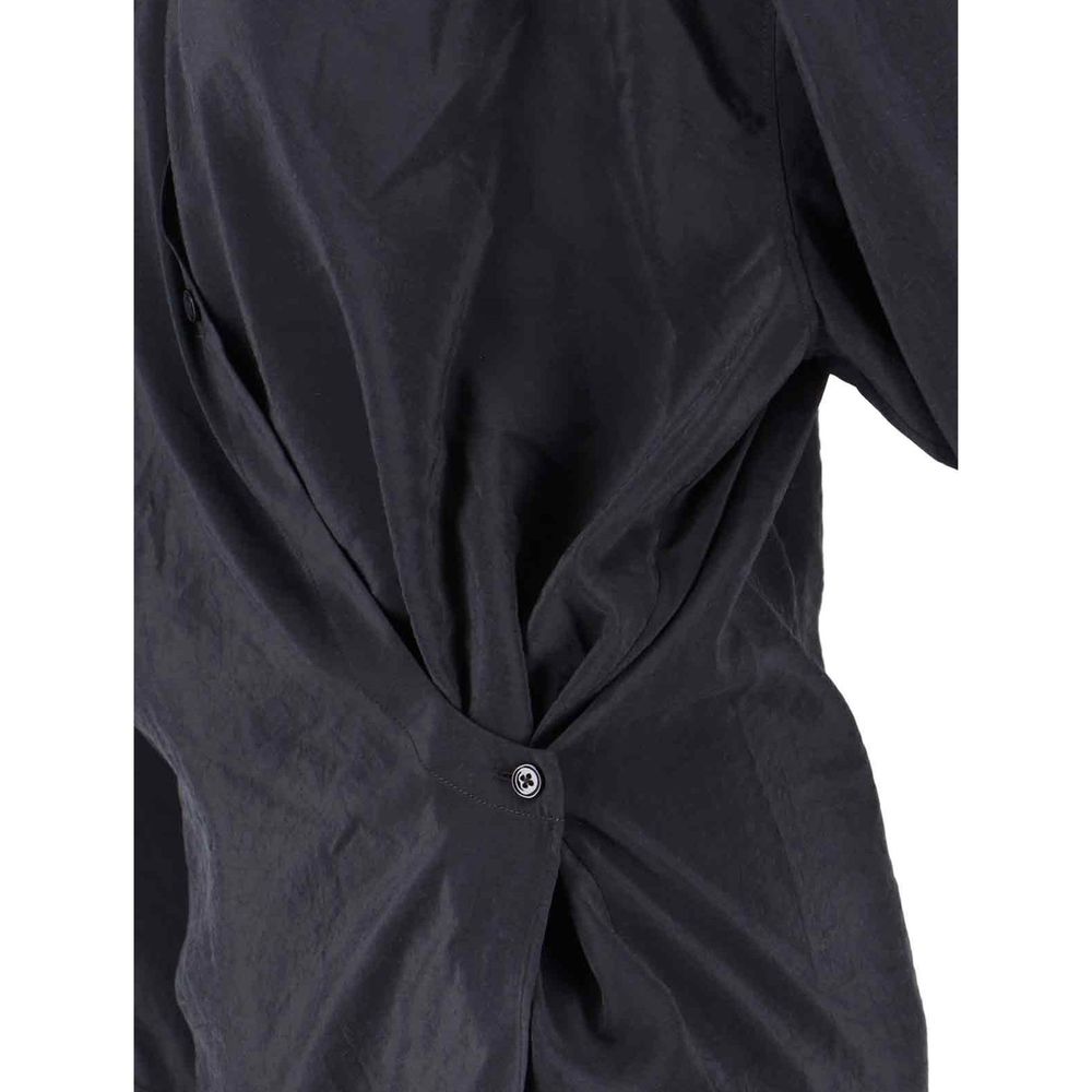 Indulge in the exquisite Lemaire Black Polyamide Shirt, a harmonious blend of silk and polyamide, embodying timeless elegance for the discerning individual.