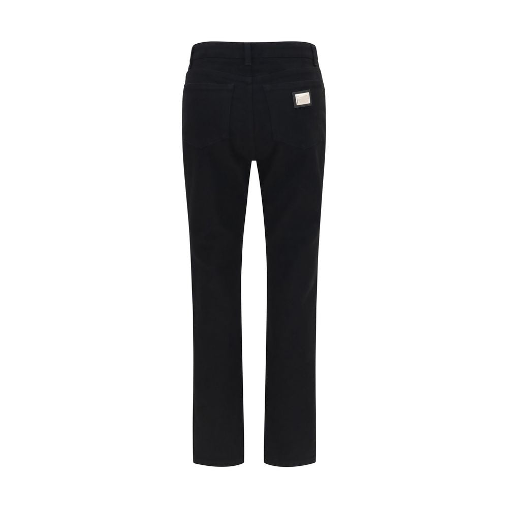 Discover the allure of Dolce & Gabbana's Black Cotton Straight-Leg Jeans, a masterpiece of craftsmanship and timeless elegance, perfect for the discerning individual.