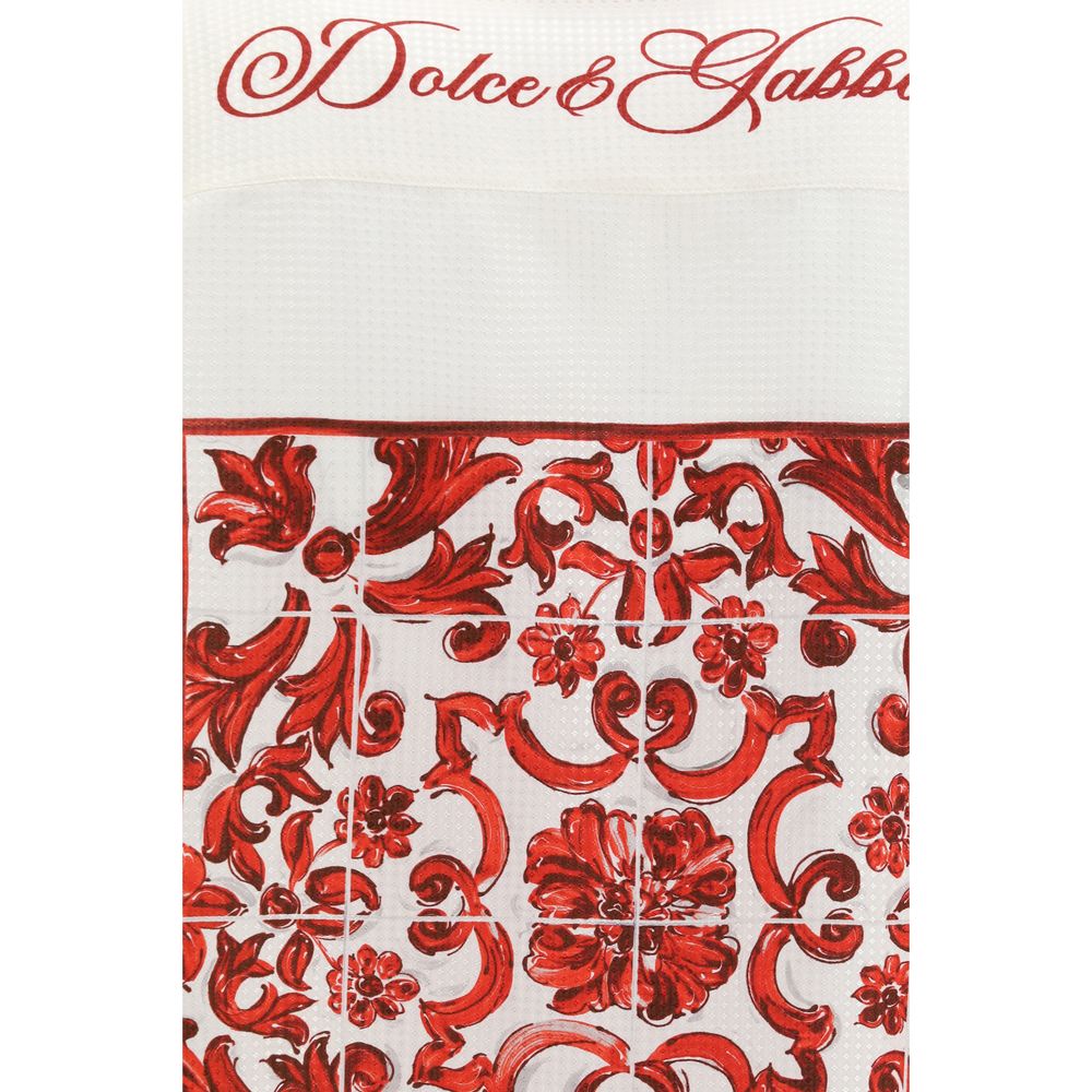 Indulge in the exquisite allure of the Dolce & Gabbana White Silk Pattern Shirt, a masterpiece of Italian craftsmanship adorned with a captivating Majolica print, perfect for the discerning connoisseur.