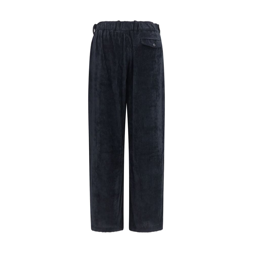Indulge in the elegance of Giorgio Armani's Black Viscose Casual Pants, crafted from luxurious ribbed viscose velvet for a sophisticated, relaxed silhouette.