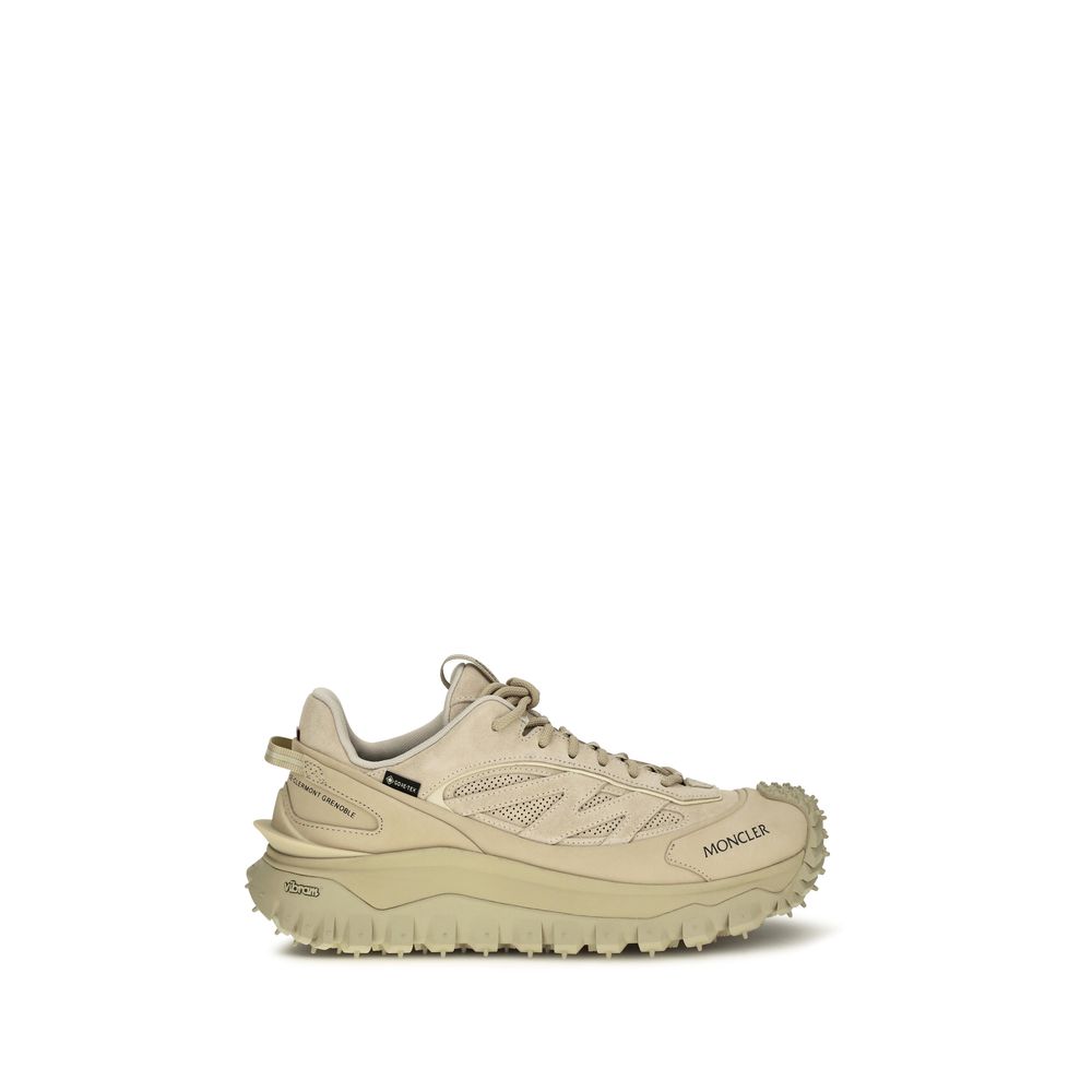 Indulge in the Moncler Beige Calf Leather Bos Taurus Athletic Sneakers, where exquisite craftsmanship meets unparalleled comfort, elevating your style with every step.
