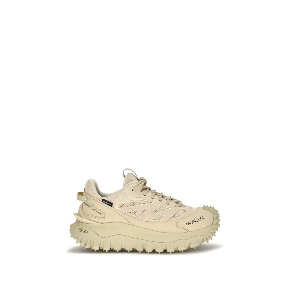 Indulge in the exquisite craftsmanship of Moncler's Beige Calf Leather Bos Taurus Athletic Sneakers, where luxury meets functionality for the discerning individual.