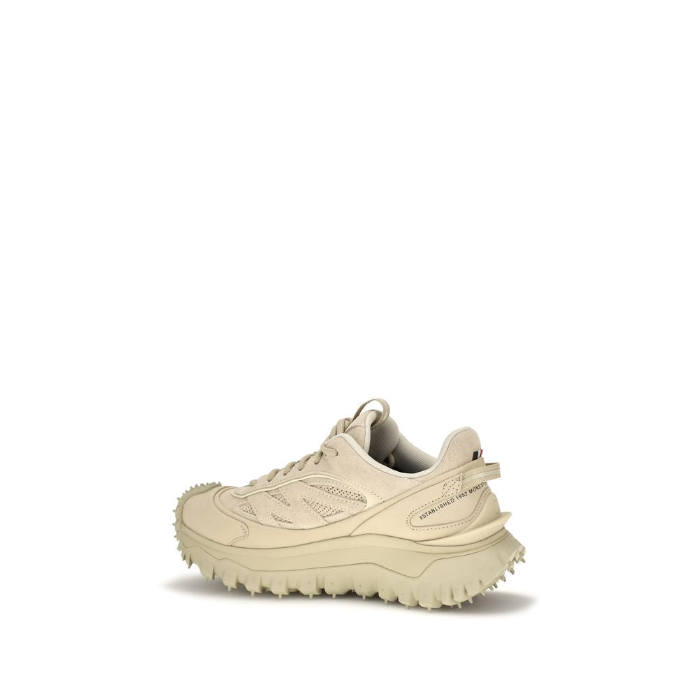 Indulge in the exquisite Moncler Beige Calf Leather Bos Taurus Athletic Sneakers, where luxurious craftsmanship meets unparalleled comfort, perfect for the discerning individual.