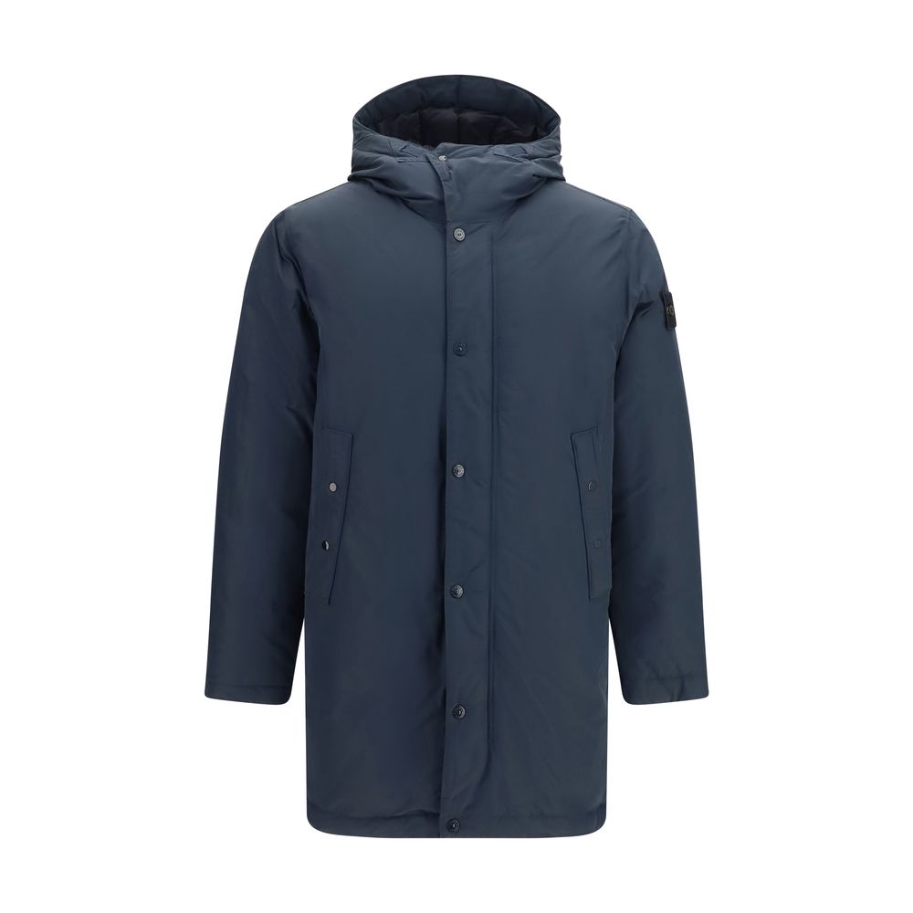 Indulge in the exquisite Stone Island Blue Polyester Coat, a masterpiece of high-density materials and RDS-certified down, embodying timeless luxury and unparalleled craftsmanship.