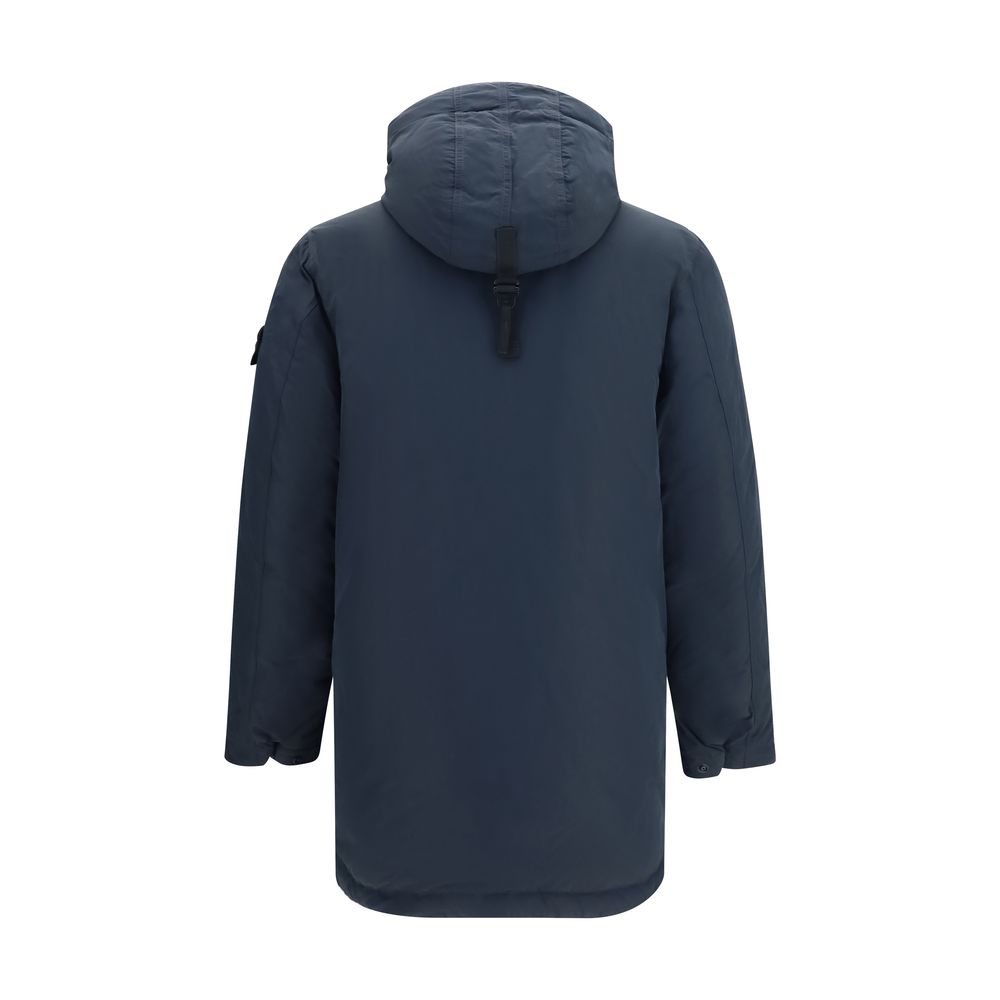 Indulge in the exquisite Stone Island Blue Polyester Coat, a masterpiece of high-density micro reps polyester and RDS-certified down, embodying timeless luxury and unparalleled craftsmanship.
