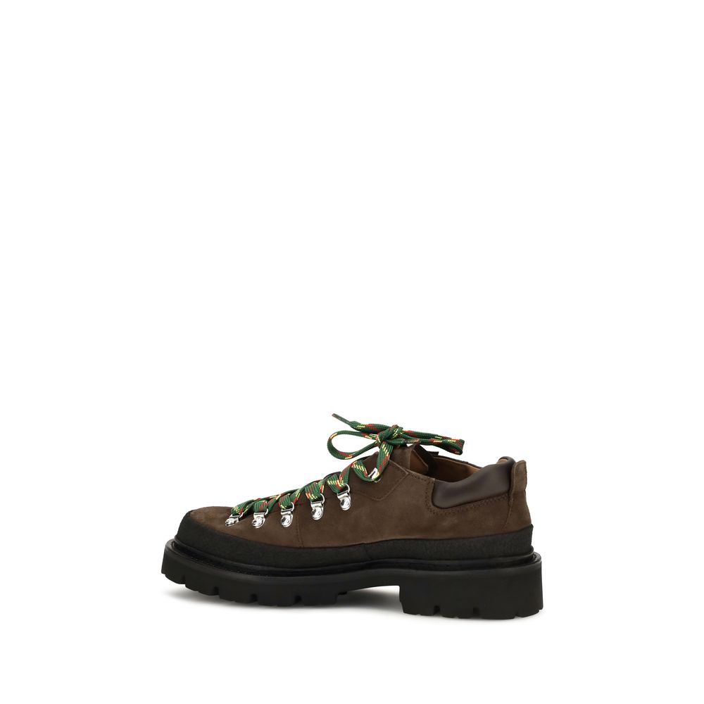 Discover the Dsquared² Brown Calf Leather Bos Taurus Lace-Up Boots, a seamless blend of casual elegance and refined craftsmanship, perfect for the discerning individual.