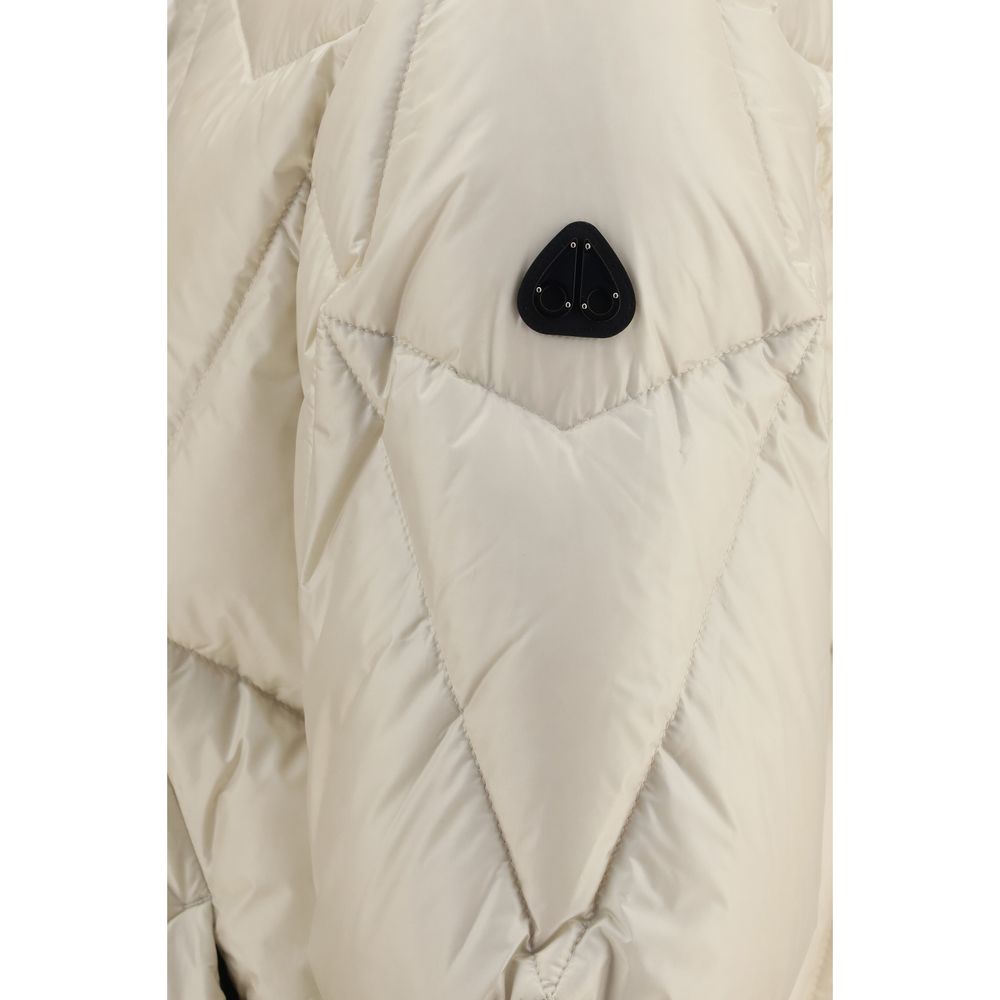 Indulge in the luxurious Moose Knuckles Beige Nylon Full-Length Jacket, a masterpiece of quilted design and comfort, perfect for the discerning individual seeking elegance and warmth.