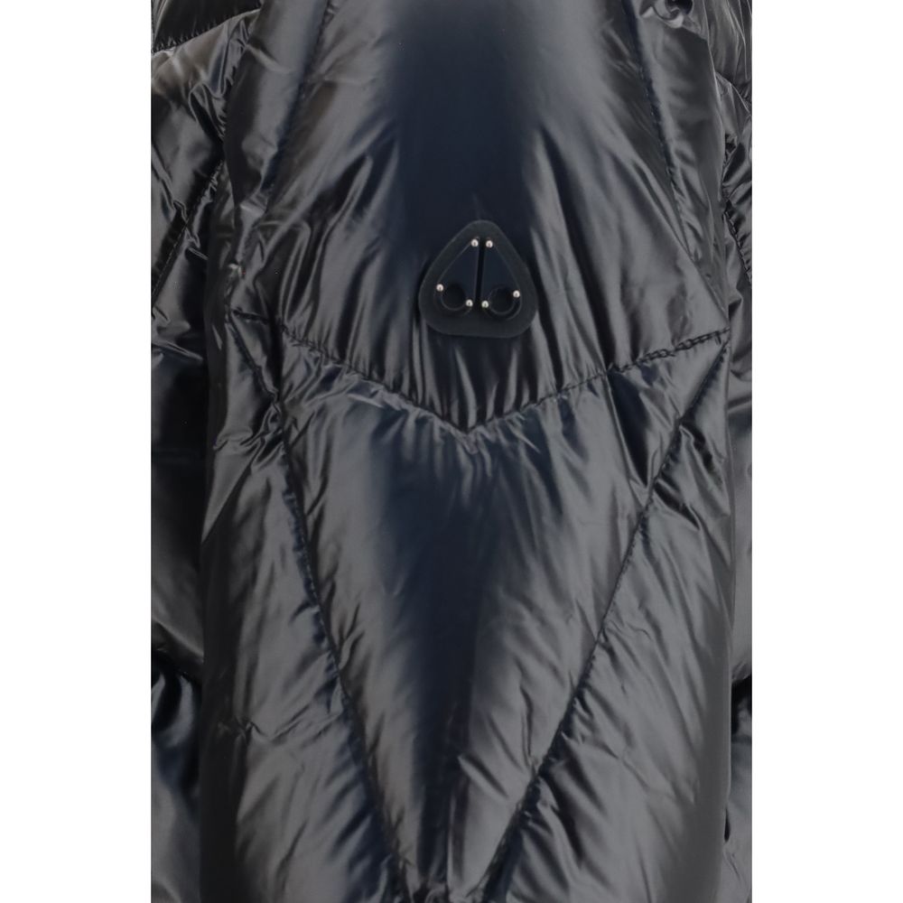 Indulge in the exquisite allure of the Moose Knuckles Black Nylon Shell Jacket, a masterful blend of comfort and sophistication, designed for those who command attention.