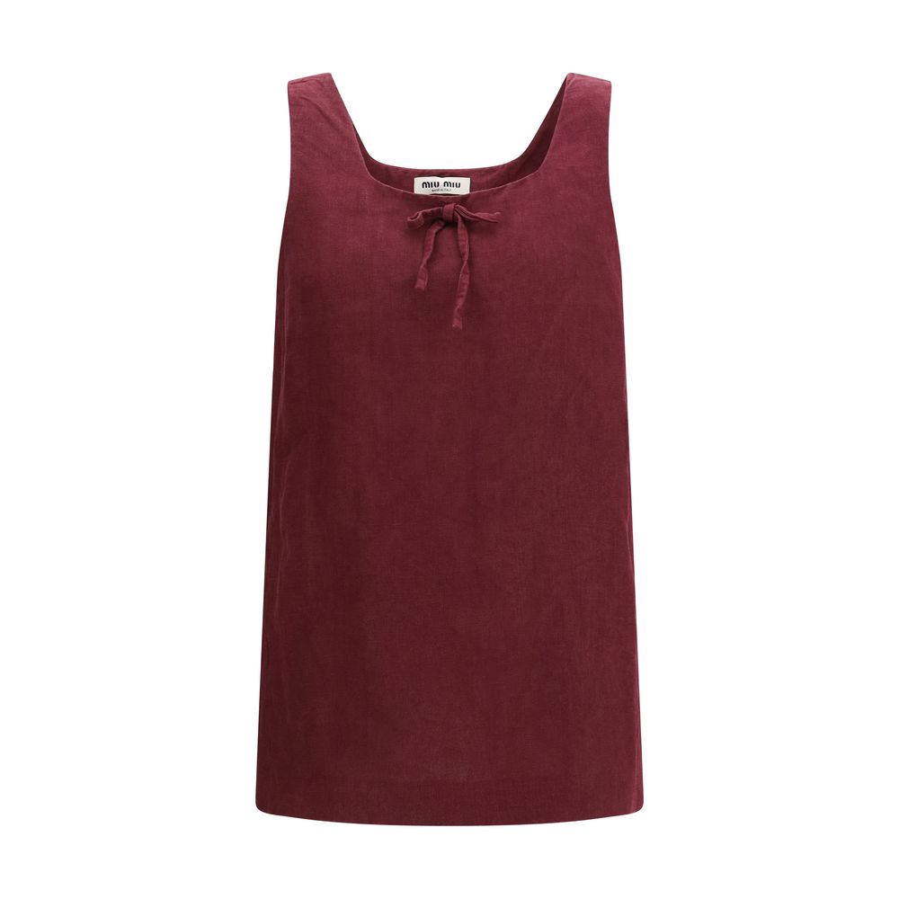 Indulge in the exquisite Miu Miu Bordeaux Linen Casual Dress, a testament to refined craftsmanship and timeless elegance, perfect for the discerning fashion connoisseur.