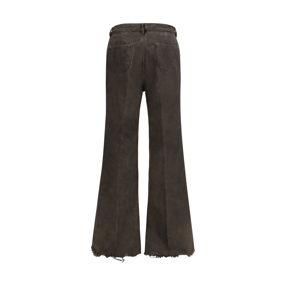 Elevate your wardrobe with Rick Owens Bicolor Cotton Flared Jeans, a bold fusion of contemporary design and luxurious craftsmanship for the discerning individual.