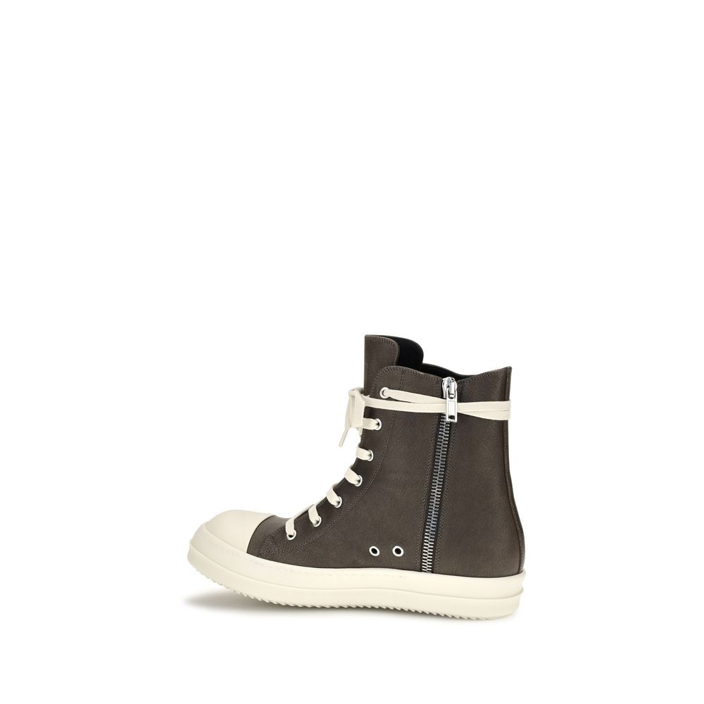 Elevate your style with Rick Owens' Brown Calf Leather Bos Taurus High Top Sneakers, a fusion of bold design and exquisite craftsmanship for the discerning individual.