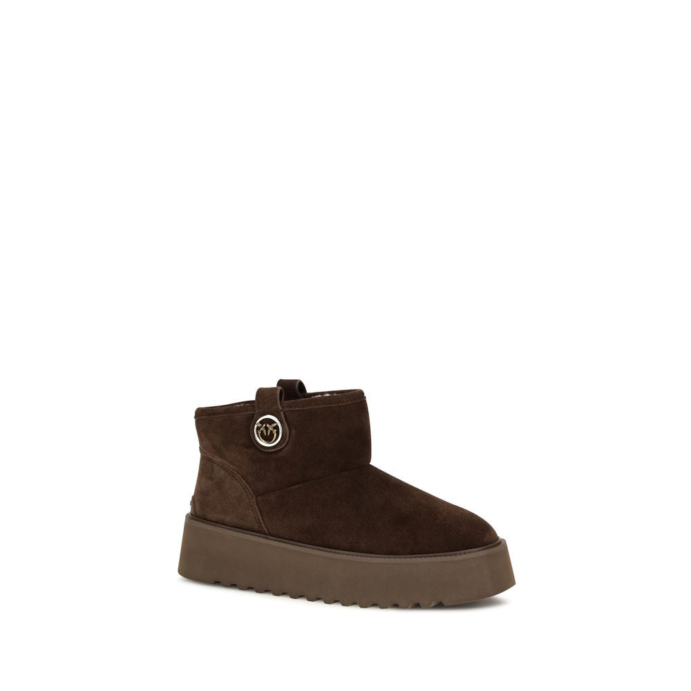 Indulge in the exquisite craftsmanship of PINKO's Brown Calf Leather Bos Taurus Flat Boots, a timeless blend of elegance and sophistication for the discerning individual.