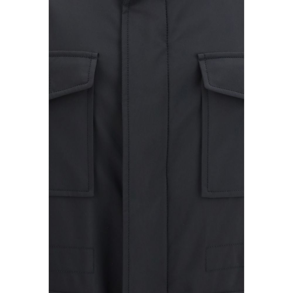 Experience the allure of the Brioni Blue Wool Oves Aries Full-Length Jacket, crafted from a luxurious wool blend for the discerning traveler seeking timeless elegance.