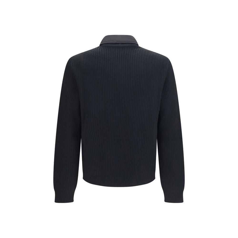 Elevate your wardrobe with the Prada Black Wool Oves Aries Full-Length Jacket, a masterpiece of refined craftsmanship and luxurious materials, perfect for the discerning individual.