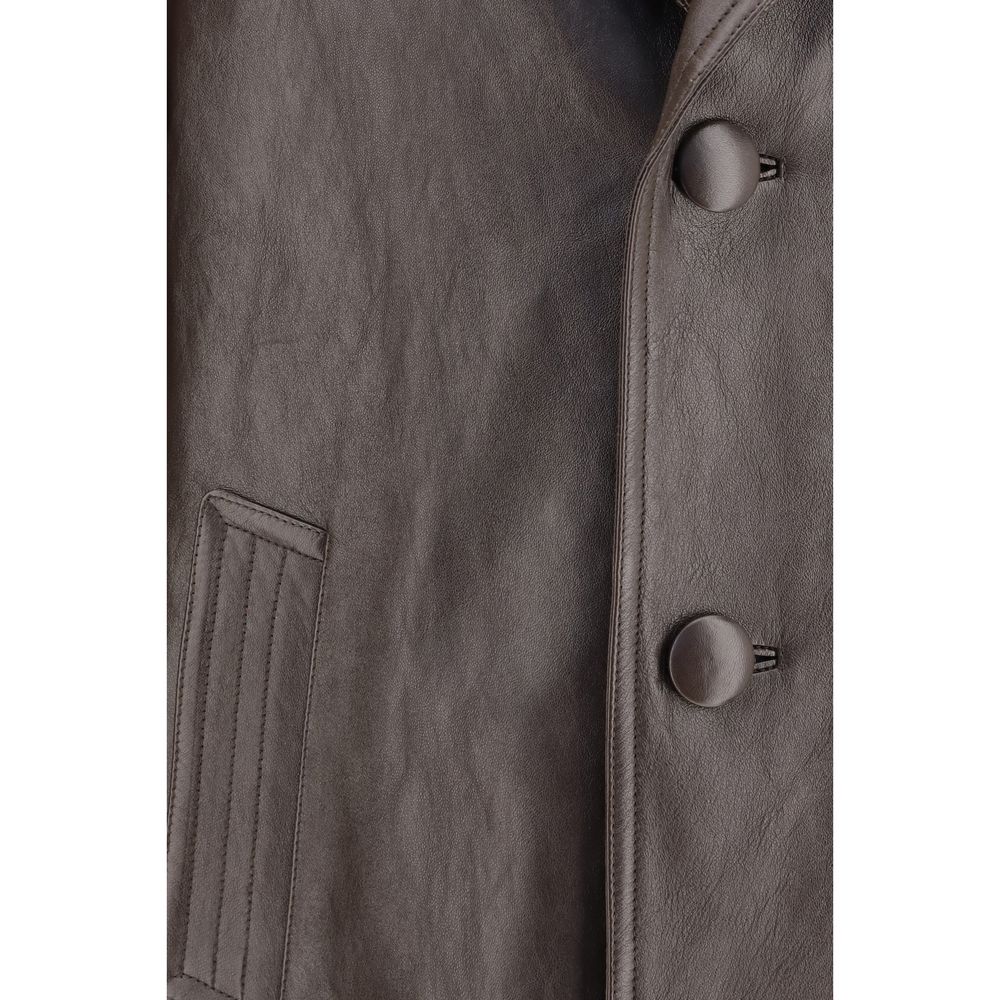 Indulge in the exquisite Prada Brown Lamb Leather Jacket, a masterpiece of soft construction and tailored elegance, perfect for those who embody sophistication and allure.