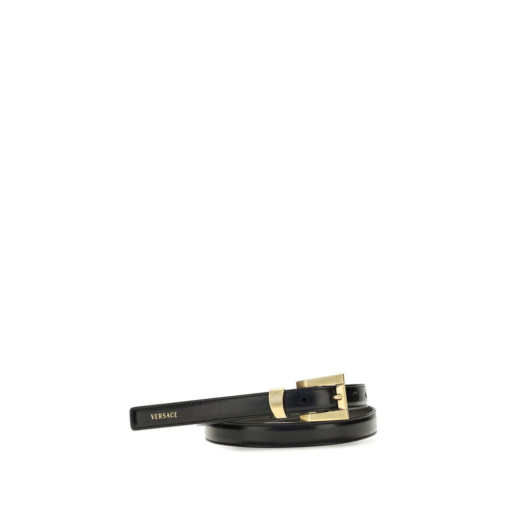 Elevate your style with the Versace Black Calf Leather Bos Taurus Regular Belt, a masterpiece of glossy leather and iconic design, embodying timeless luxury and sophistication.