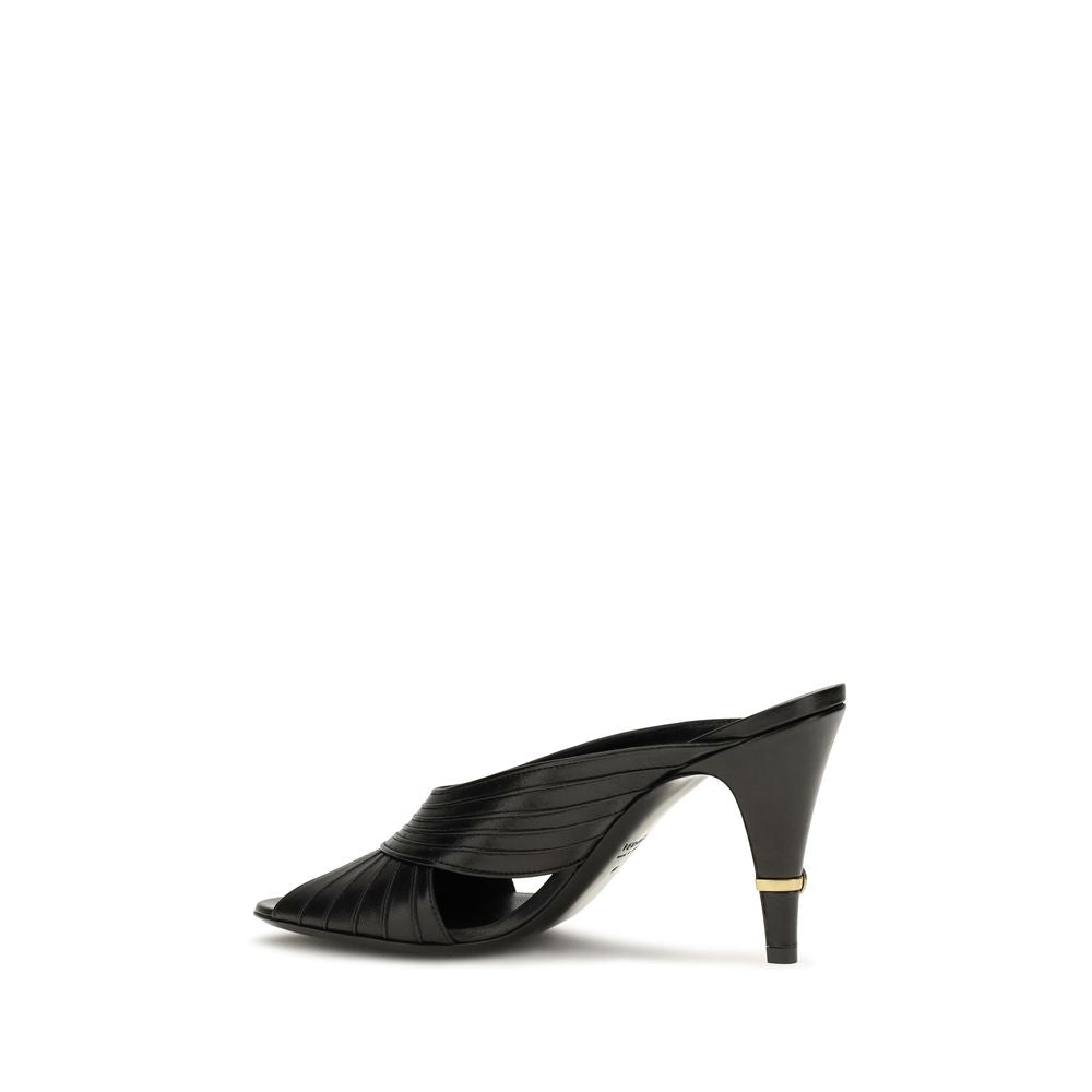 Indulge in the elegance of Versace Black Lamb Ovis Aries Aries Mules, crafted from luxurious nappa leather, embodying sophistication and timeless allure for the discerning connoisseur.