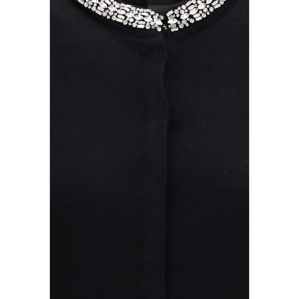 Indulge in the exquisite PINKO Black Wool Oves Aries Cardigan, a masterpiece of craftsmanship featuring a jewel collar and luxurious wool blend, perfect for elevating your style.