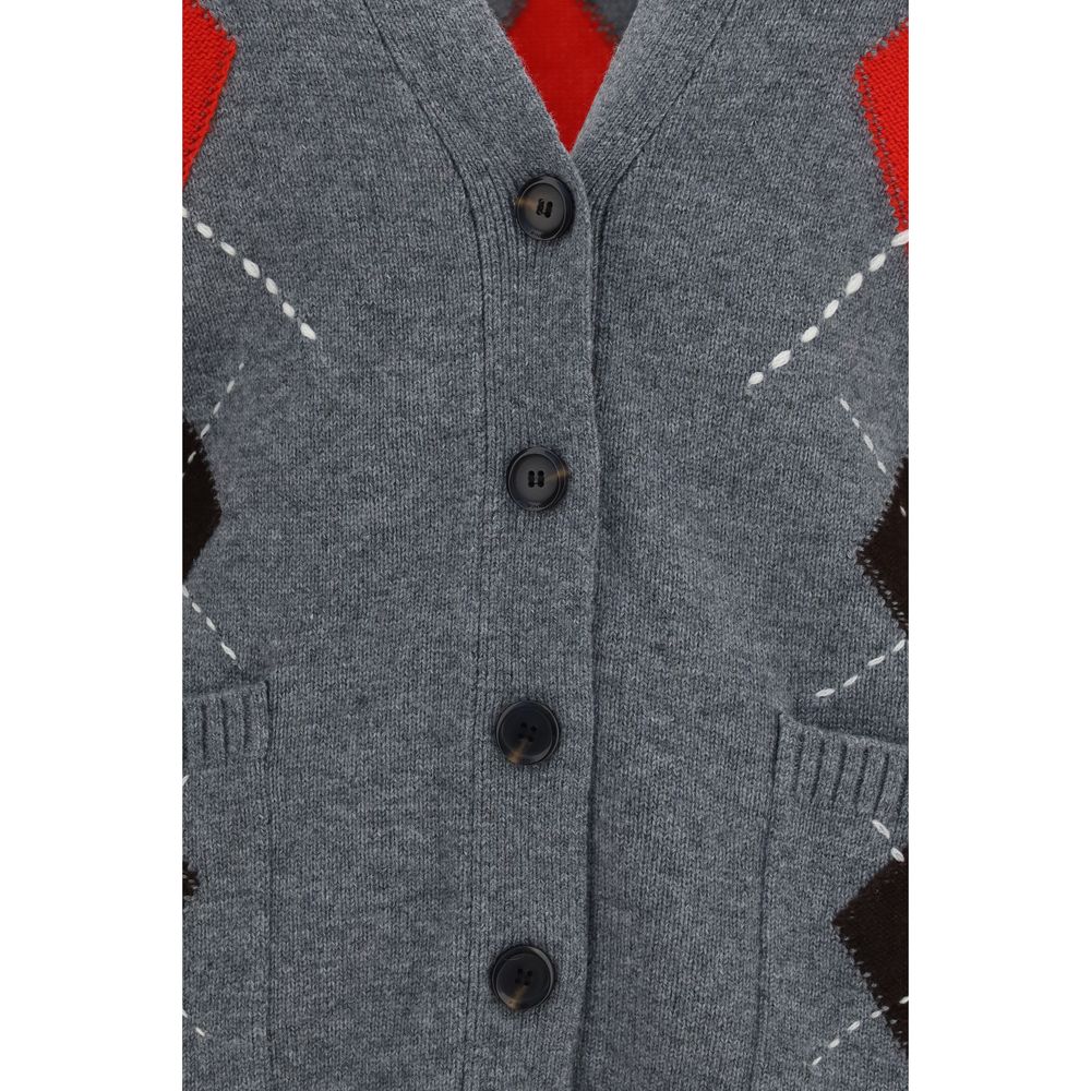 Indulge in the exquisite PINKO Gray Wool Oves Aries Cardigan, a masterpiece of soft wool and cashmere, designed for those who appreciate refined elegance and timeless luxury.