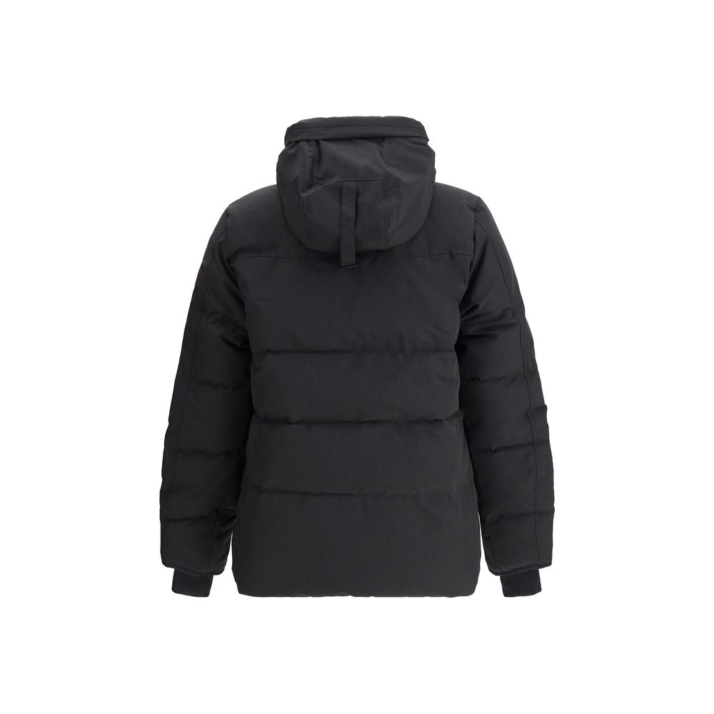 Discover the Canada Goose Black Cotton Parka, a masterful blend of warmth and elegance, designed for those who embrace luxury and functionality in every season.