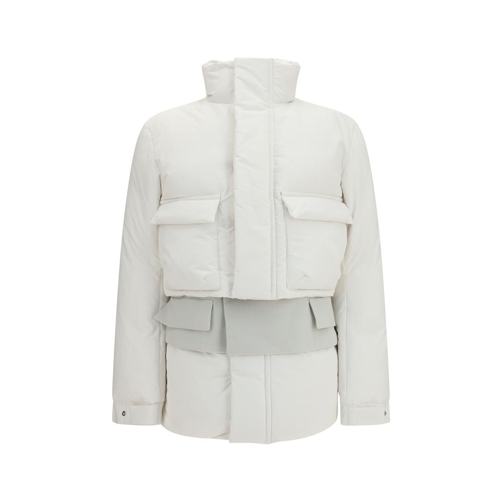Discover the Sacai White Polyester Full-Length Jacket, an exquisite fusion of style and comfort, perfect for those who embody elegance and sophistication.