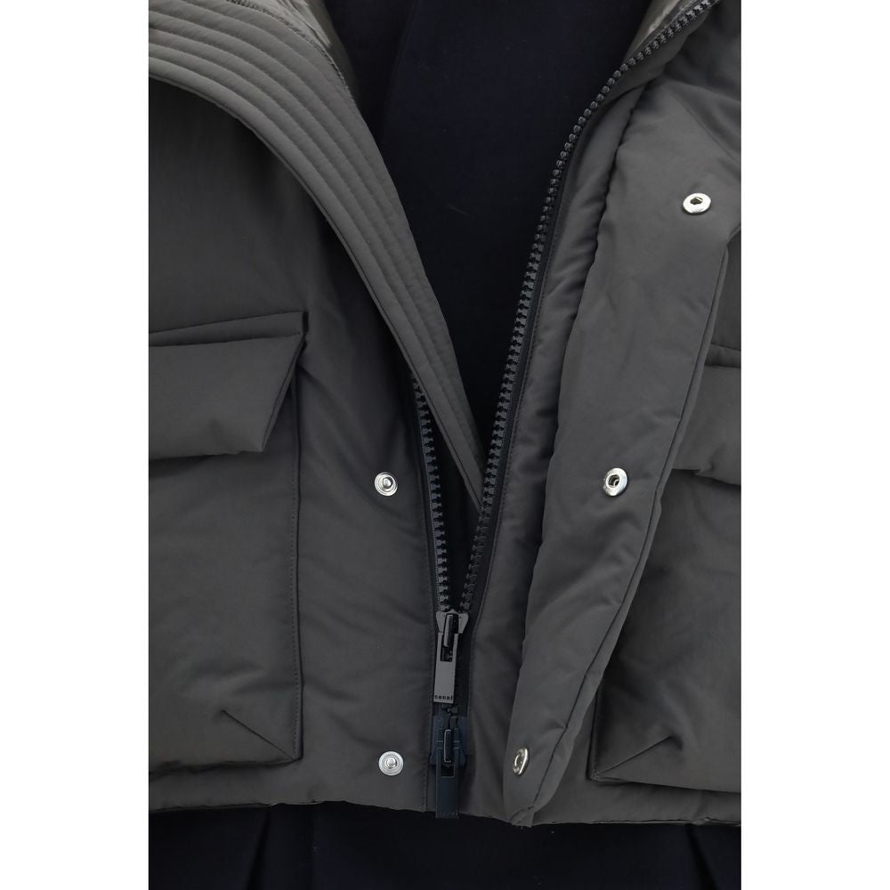 Indulge in the exquisite Sacai Multicolor Polyester Coat, a masterful blend of jacket and coat elements, crafted for those who embody elegance and sophistication.