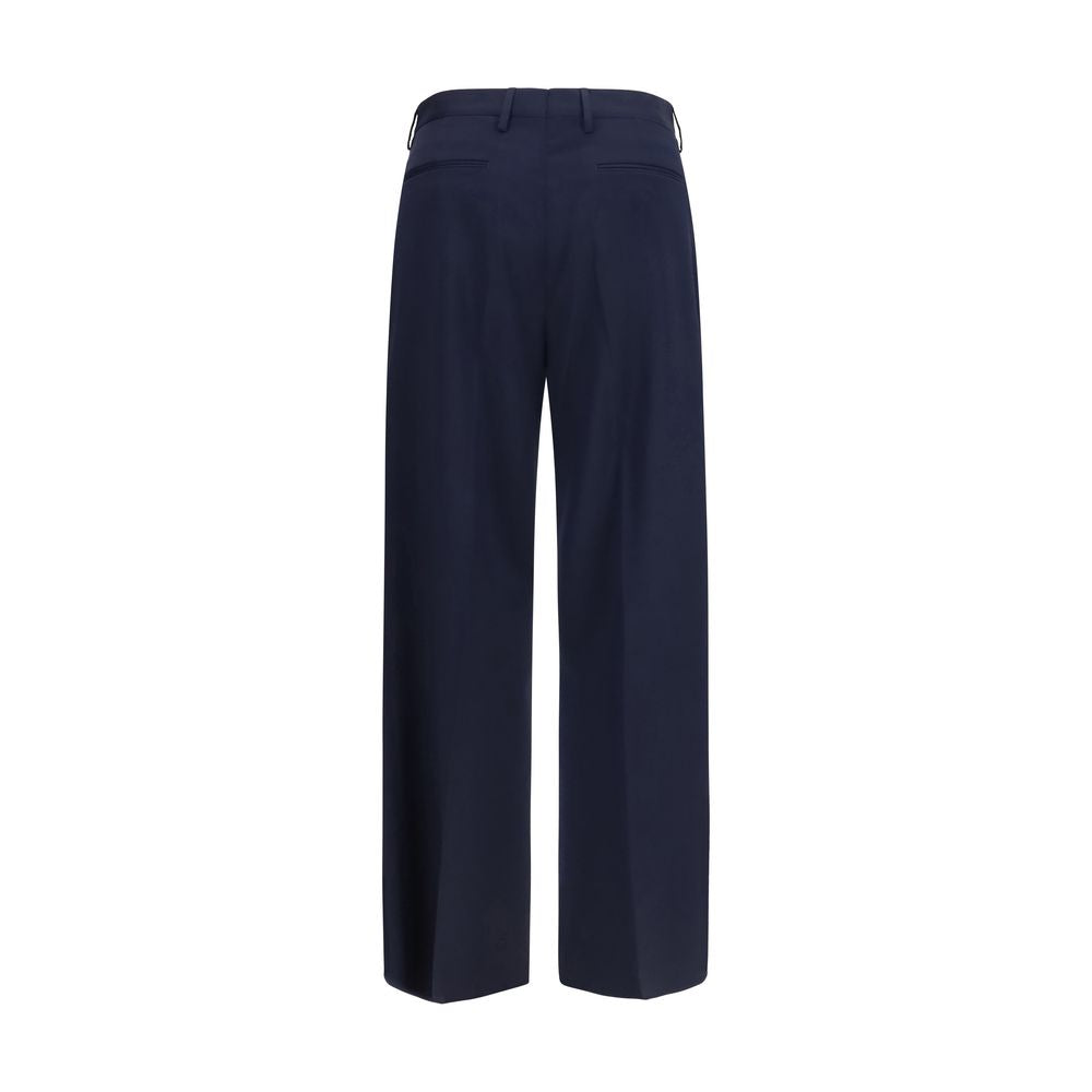 Experience the allure of Vivienne Westwood's Blue Wool Oves Aries Dress Pants, crafted from virgin wool for refined elegance and timeless sophistication.