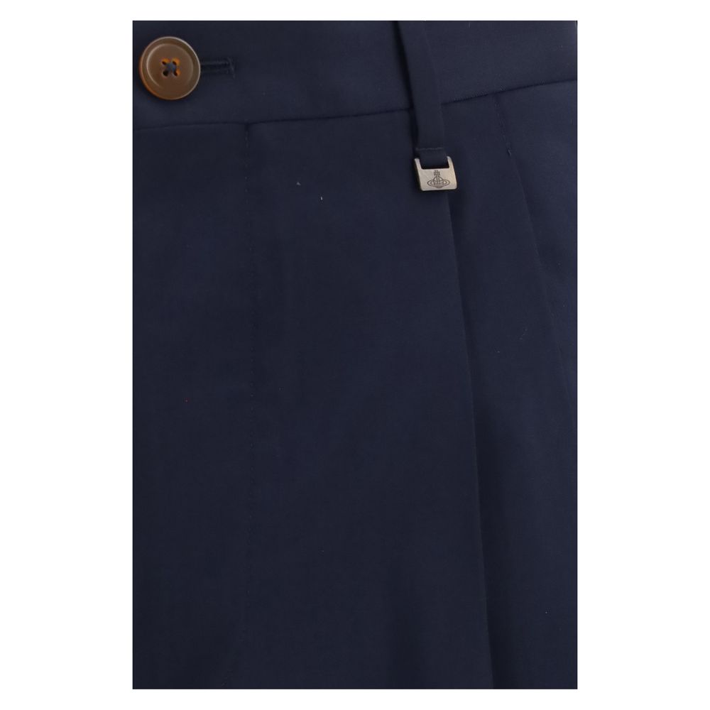 Elevate your wardrobe with Vivienne Westwood's Blue Wool Oves Aries Dress Pants, crafted from virgin wool for a sophisticated, timeless silhouette that embodies luxury and elegance.