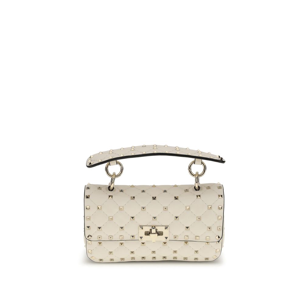 Indulge in the elegance of the Valentino Garavani Rockstud Spike mini Top Handle Bag, crafted from sumptuous lamb nappa leather, a statement of refined luxury and timeless sophistication.