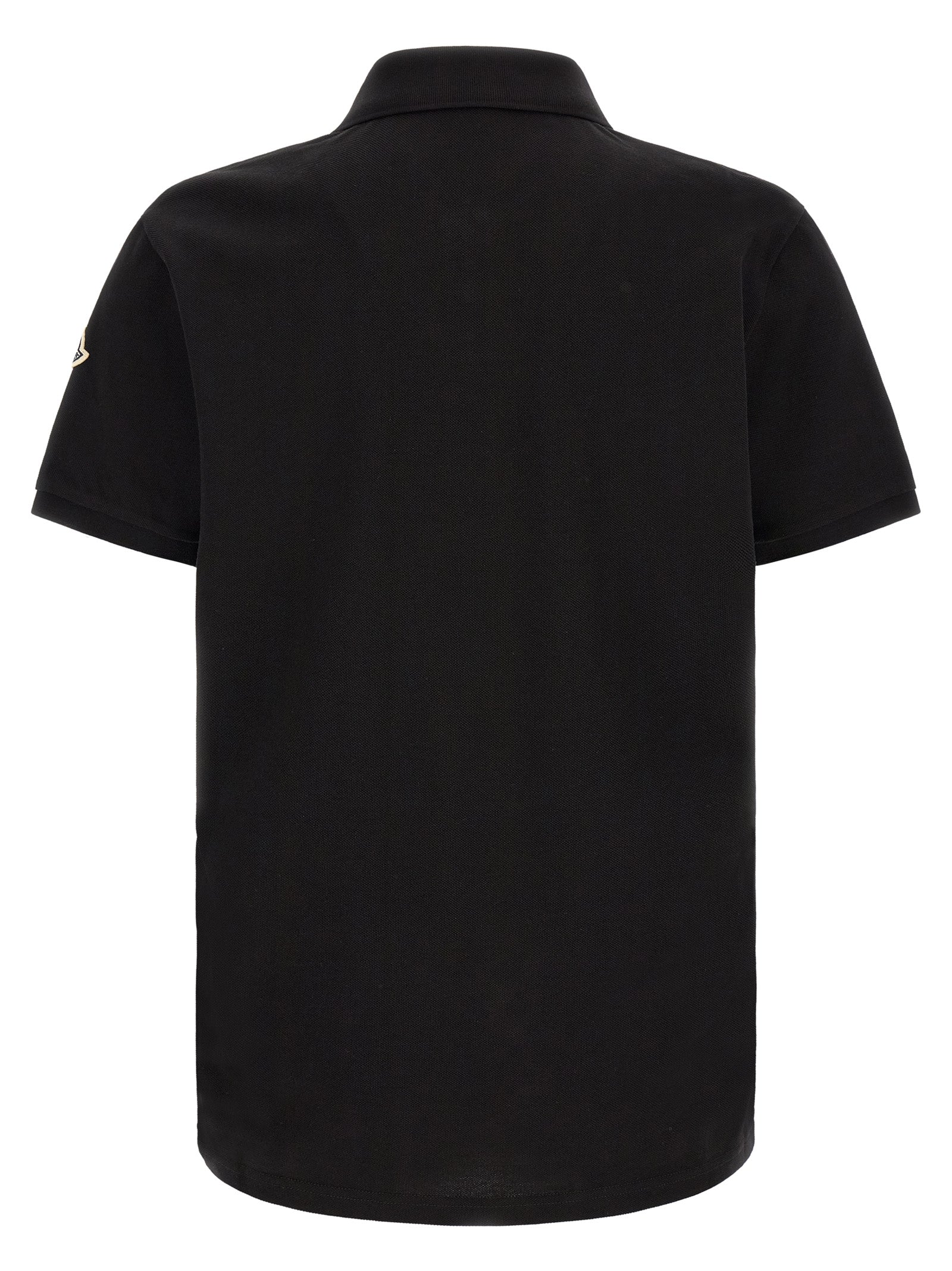 Discover the Moncler Black Cotton Polo Shirt, a testament to refined craftsmanship and timeless elegance, perfect for those who appreciate luxury in every detail.