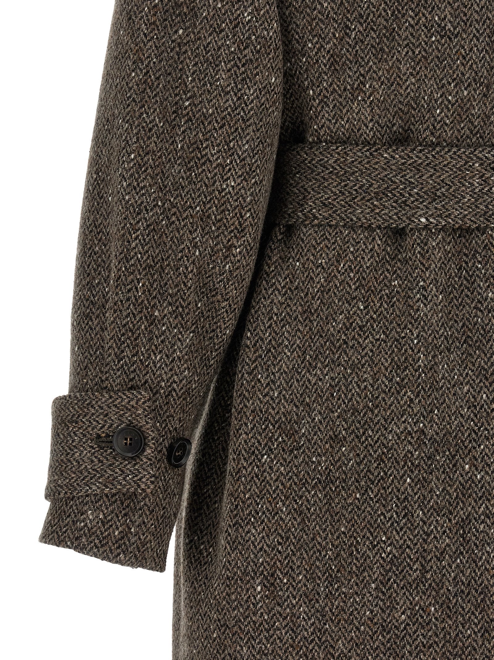 Elevate your outerwear collection with the Kiton Brown Virgin Wool Coat, a masterpiece of craftsmanship featuring a deconstructed robe silhouette and sophisticated chevron texture.