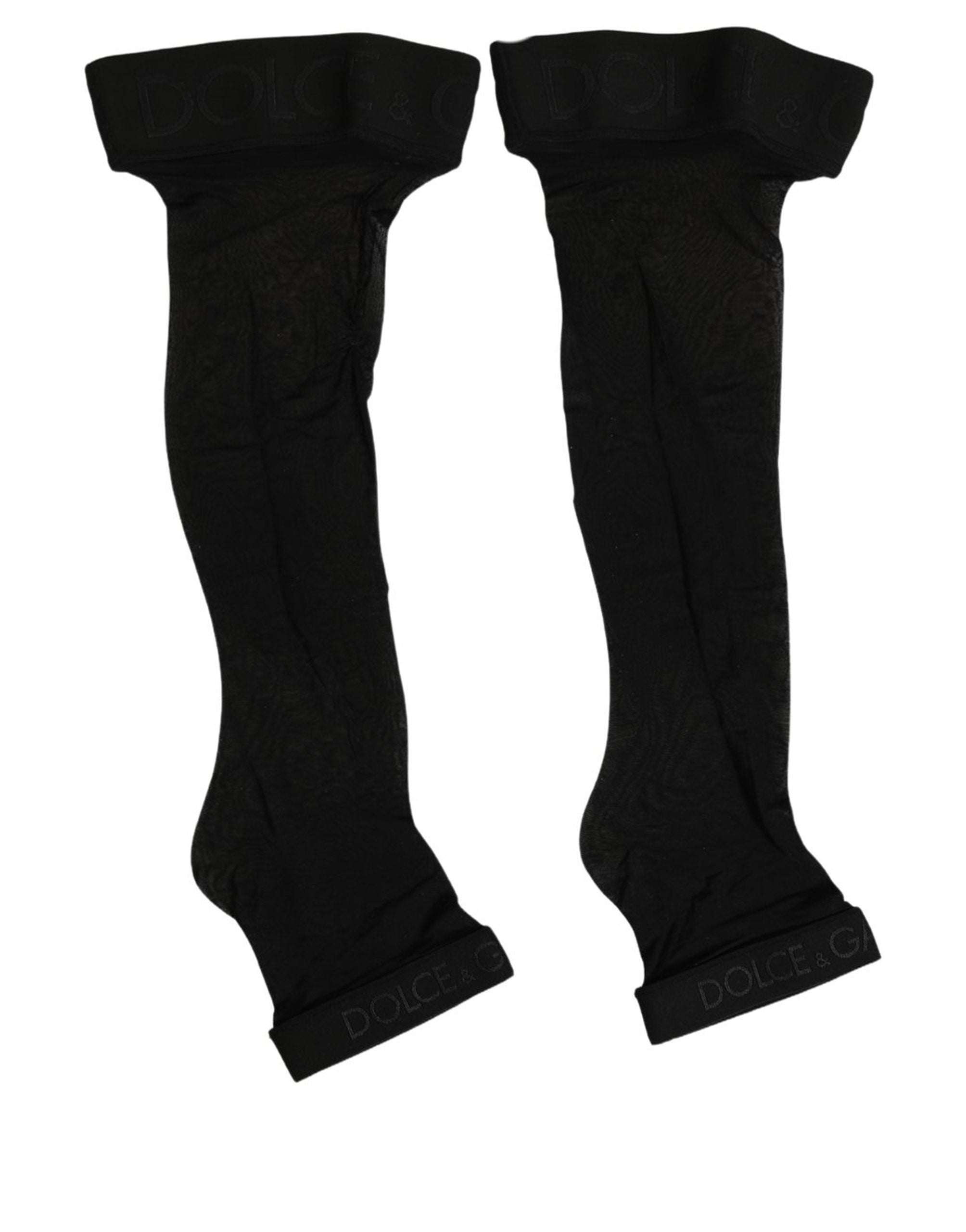 Indulge in the exquisite allure of Dolce & Gabbana's Black Nylon Logo Calf Long Socks, where luxurious craftsmanship meets iconic style, perfect for the discerning individual.