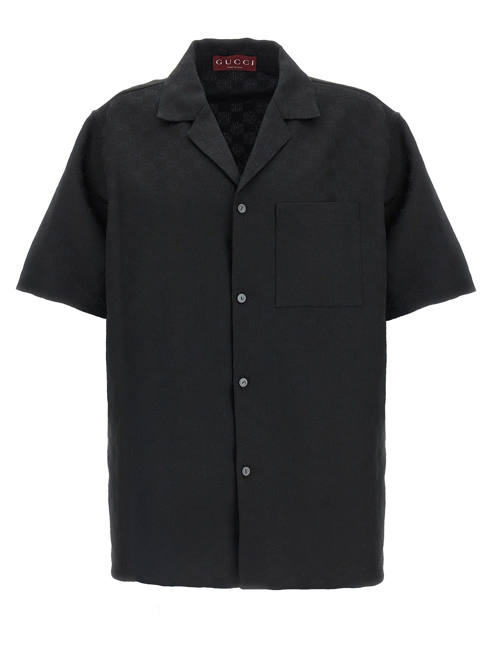 Elevate your wardrobe with the Gucci Black Linen Blouse, a masterpiece of Italian craftsmanship featuring a chic V-neck and luxurious fabric, perfect for making bold statements.