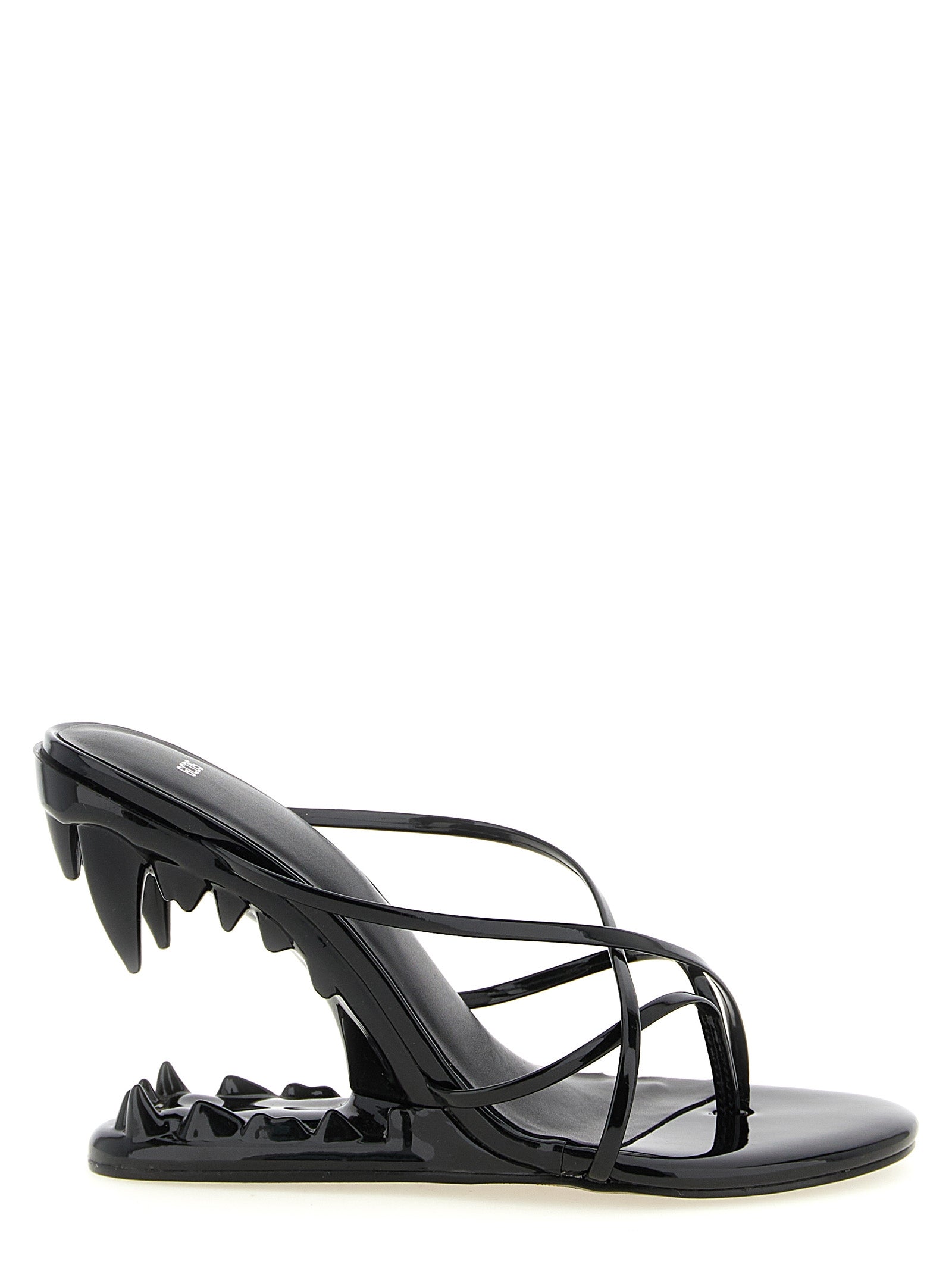 Step into a realm of elegance with GCDS Morso Thong Sandals, where high-shine patent leather meets sculptural design, embodying luxury and bold sophistication.