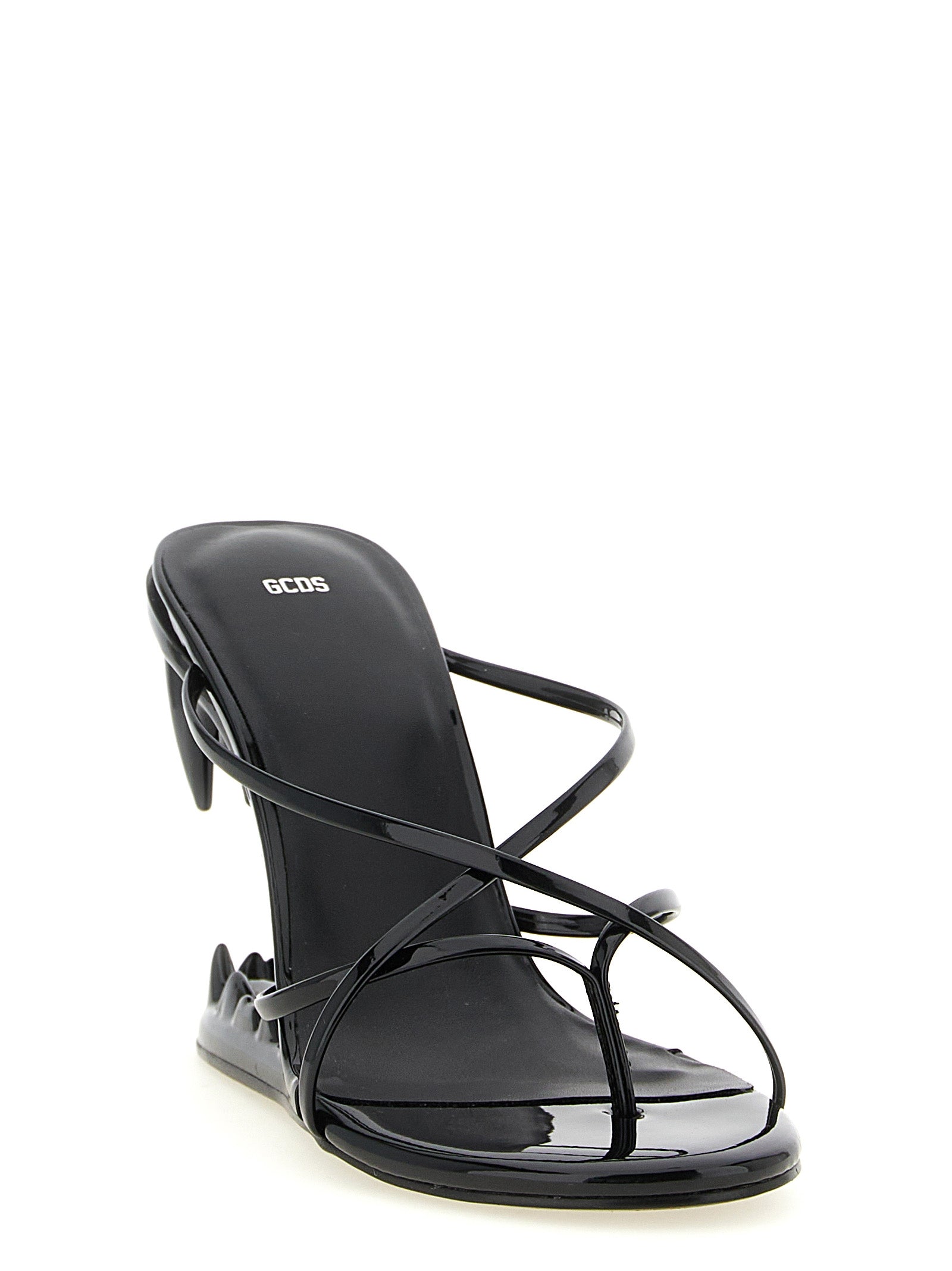 Step into a realm of elegance with GCDS Morso Thong sandals, where high-shine patent leather meets sculptural artistry, embodying the essence of luxury and sophistication.