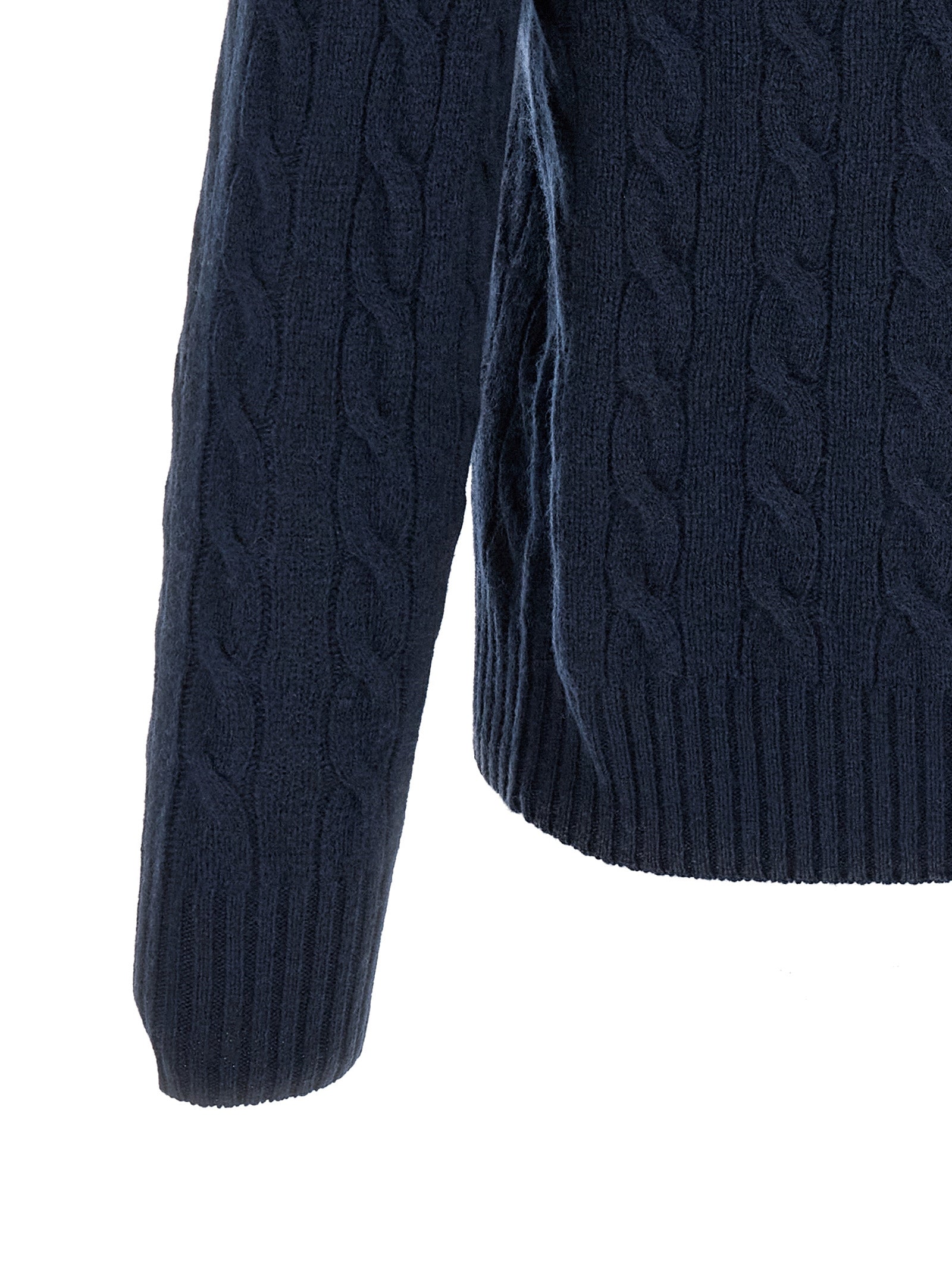 Indulge in the timeless elegance of the Polo Ralph Lauren Blue Wool Cardigan, a luxurious blend of wool and cashmere that embodies sophistication and modern charm.