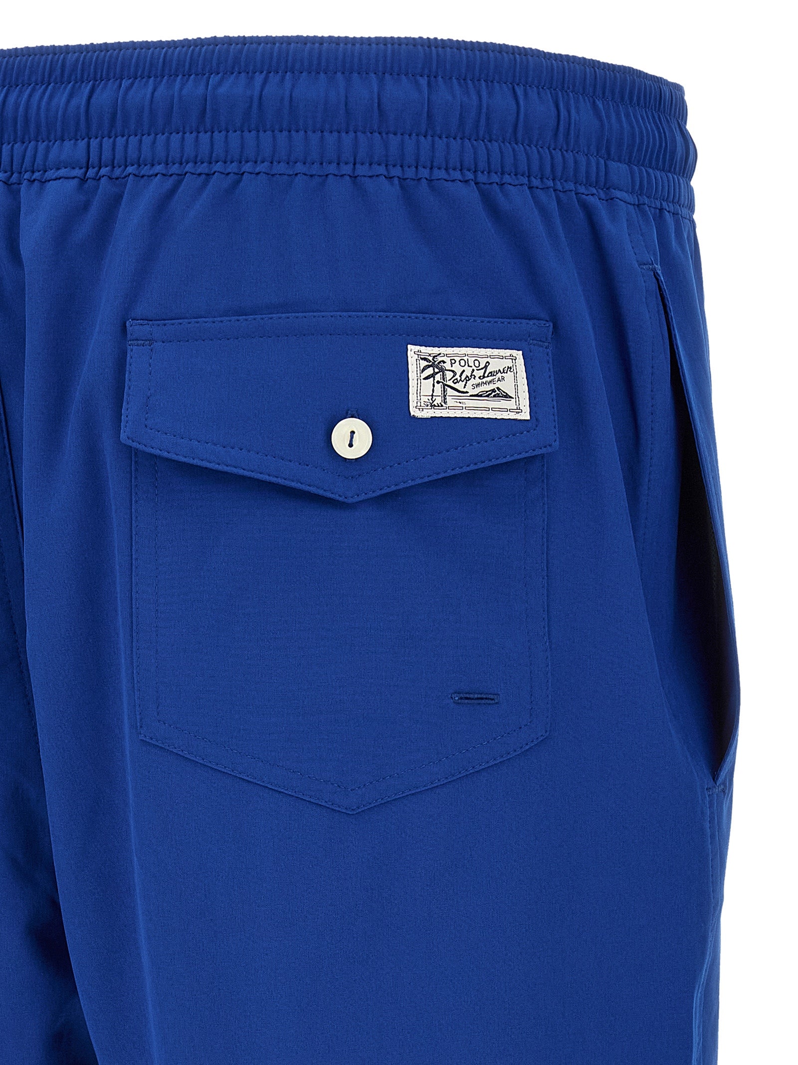 Indulge in the elegance of Polo Ralph Lauren's Blue Polyester Swim Shorts, crafted for discerning tastes, merging style and comfort for luxurious poolside moments.
