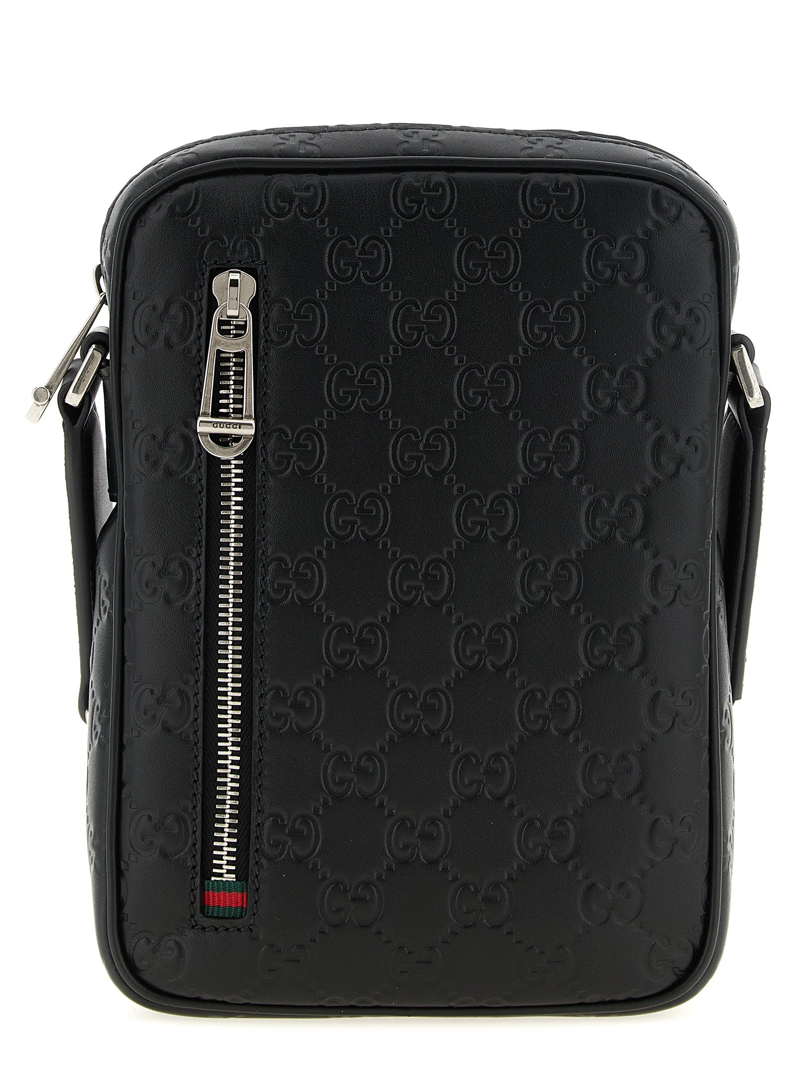 Indulge in the exquisite allure of the Gucci Black Calfskin Crossbody Bag, a statement of luxury and sophistication, crafted for those who appreciate timeless elegance.
