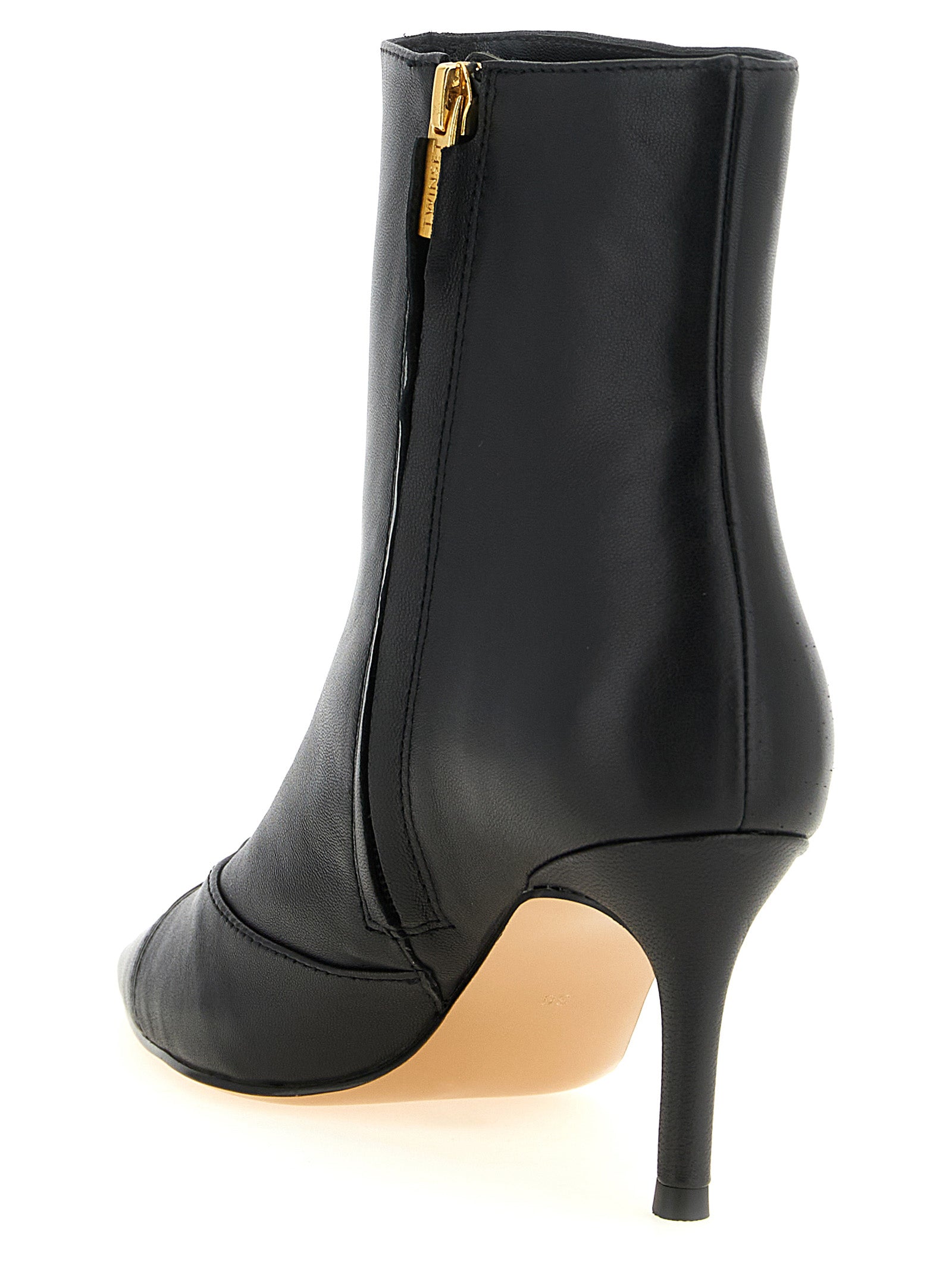 Elevate your style with TWINSET's Black Leather Ankle Boots, a fusion of exquisite craftsmanship and timeless elegance, designed for the discerning individual.